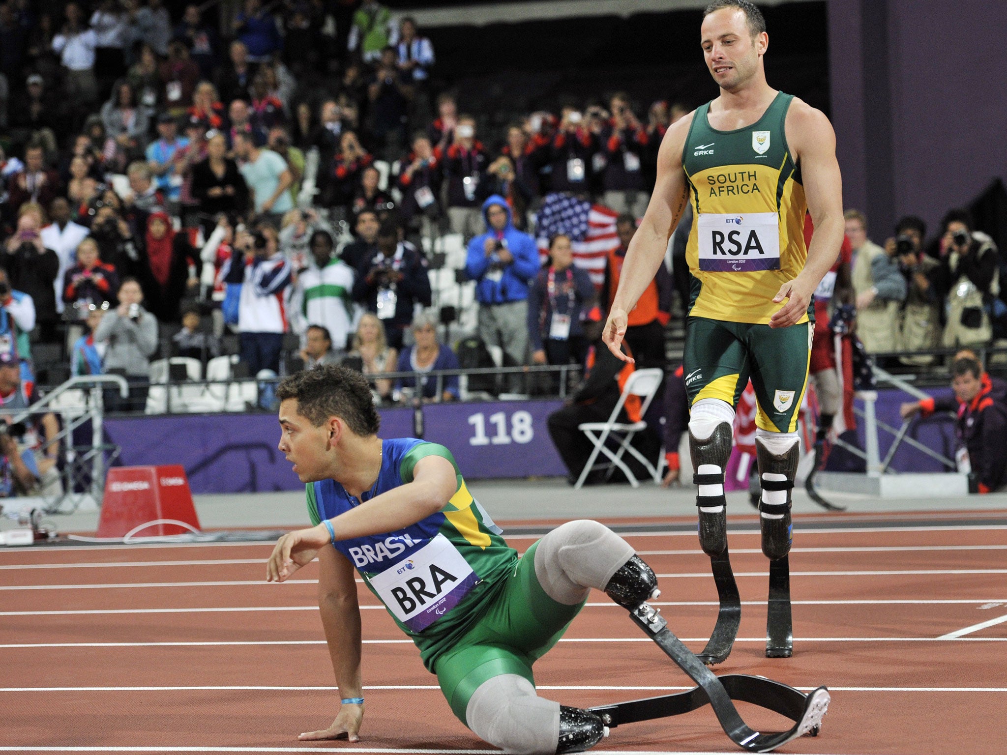 Oscar Pistorius with Brazil’s Alan Oliveira at the London Paralympics