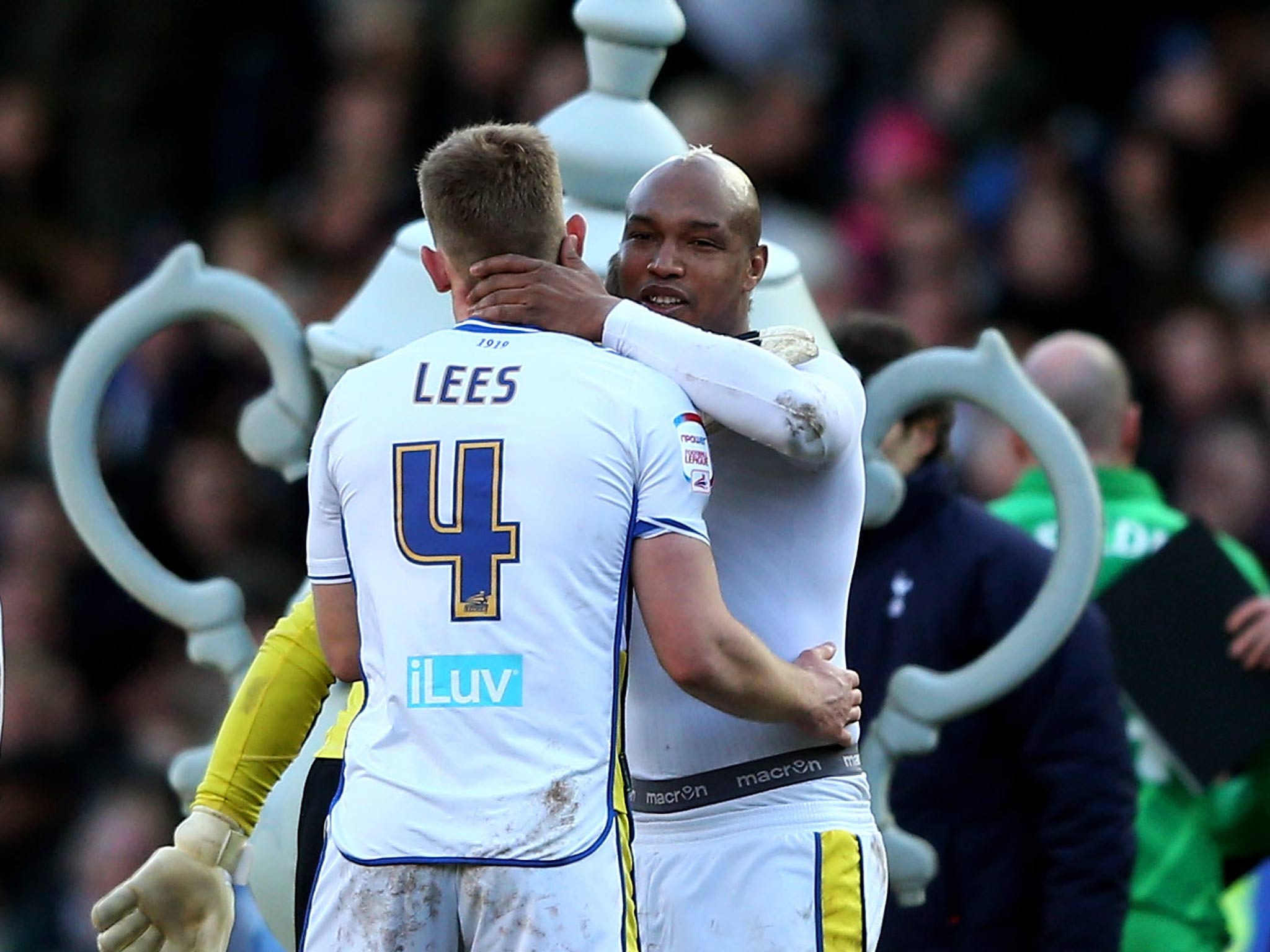Tom Lees and El-Hadji Diouf of Leeds celebrate their team's 2-1 victory over Tottenham in the FA Cup fourth round