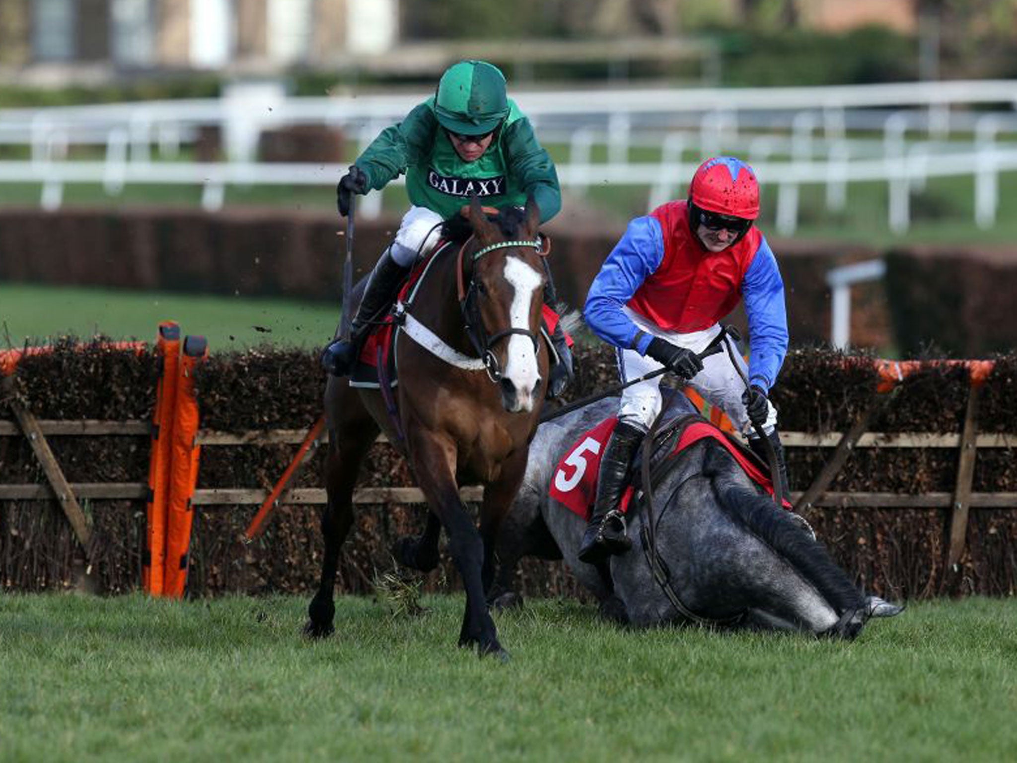 Utopies des Bordes (left) on her way to victory at Sandown yesterday