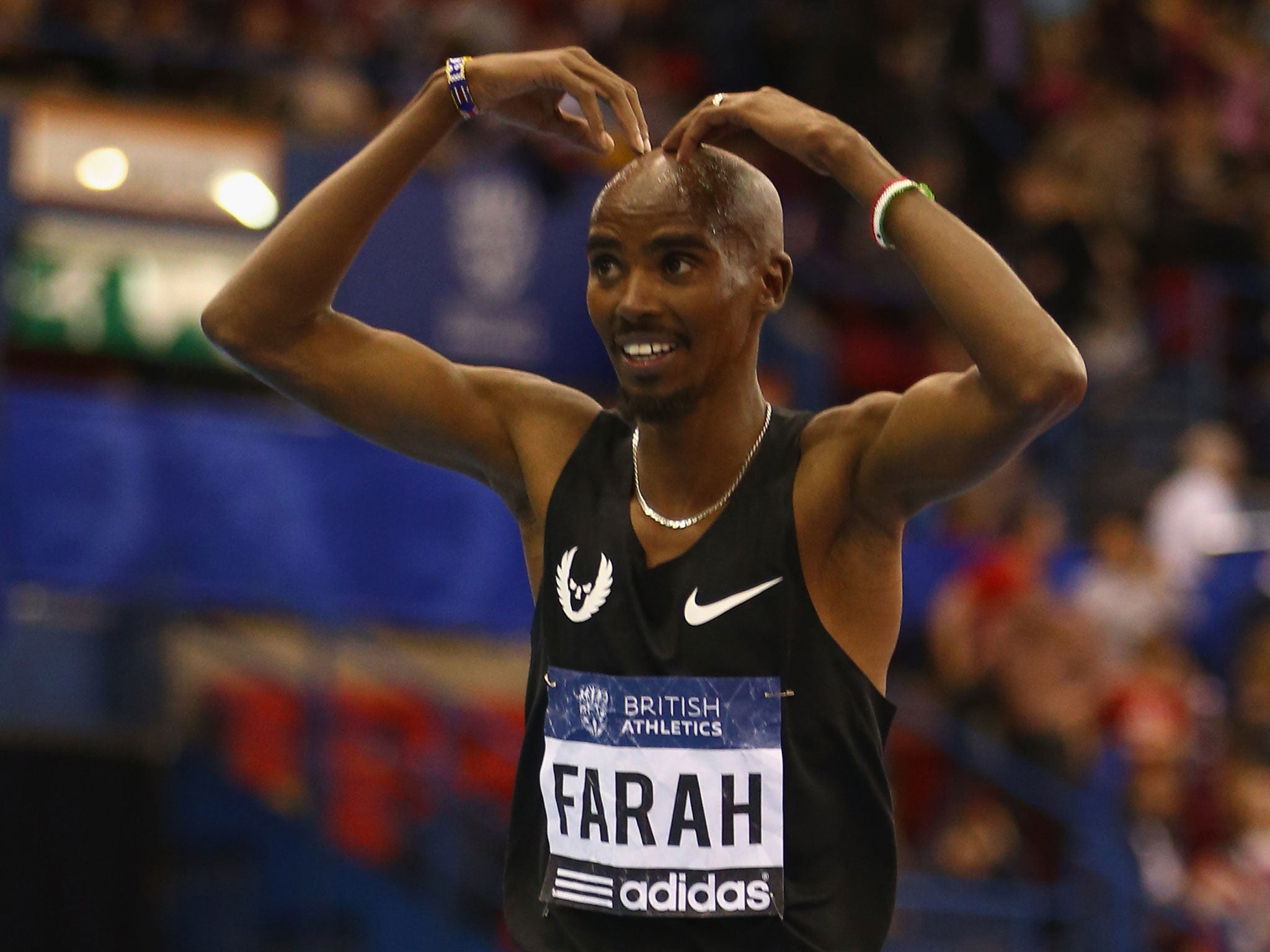 Mo Farah celebrates his 3,000m win