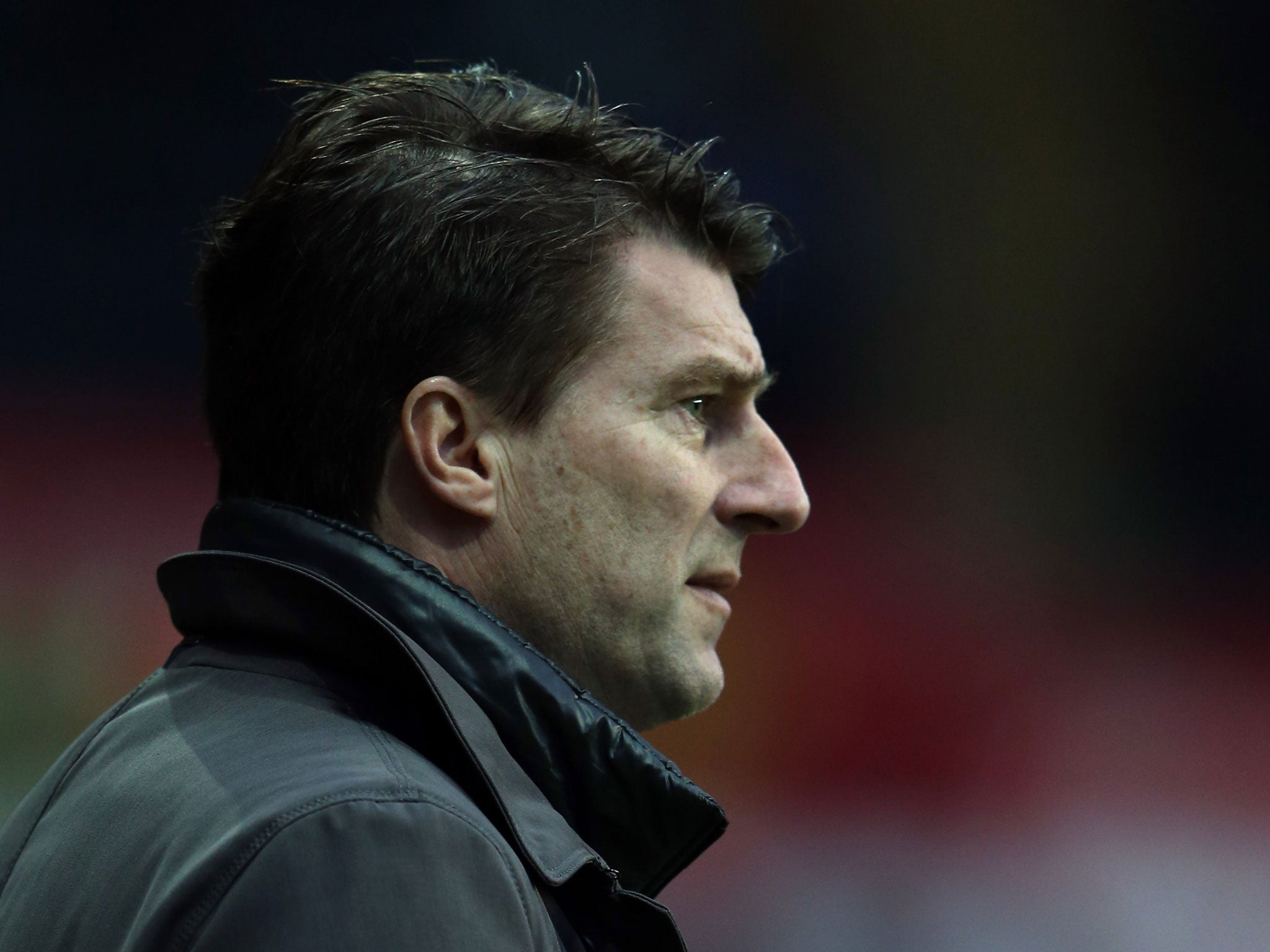 A portrait of Michael Laudrup, manager of Swansea City