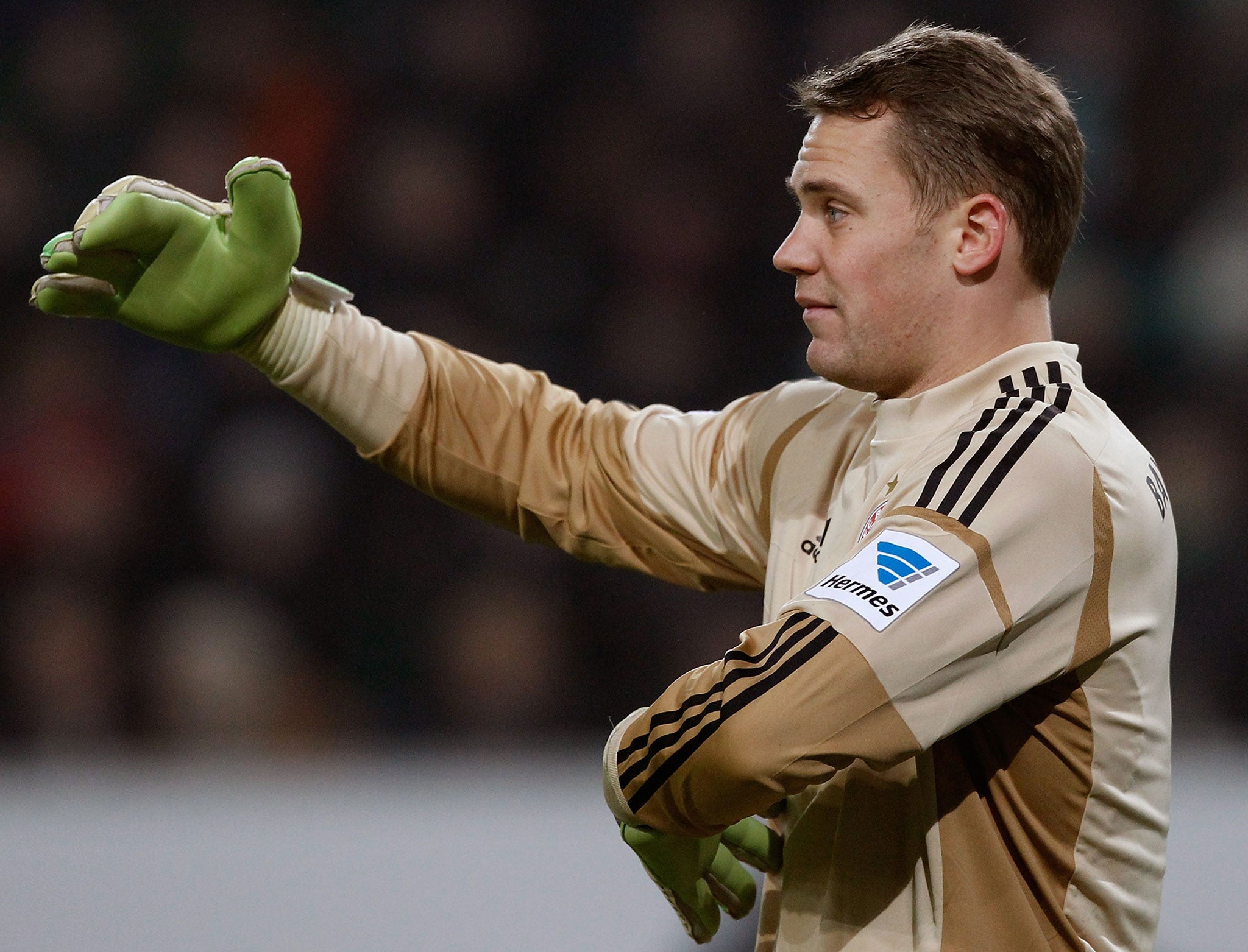Bayern Munich's Manuel Neuer, sporting a four-fingered glove