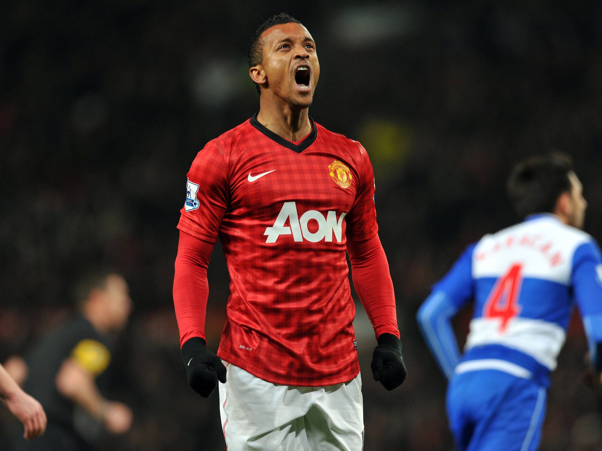 Manchester United player Nani celebrates his goal against Reading in the FA Cup