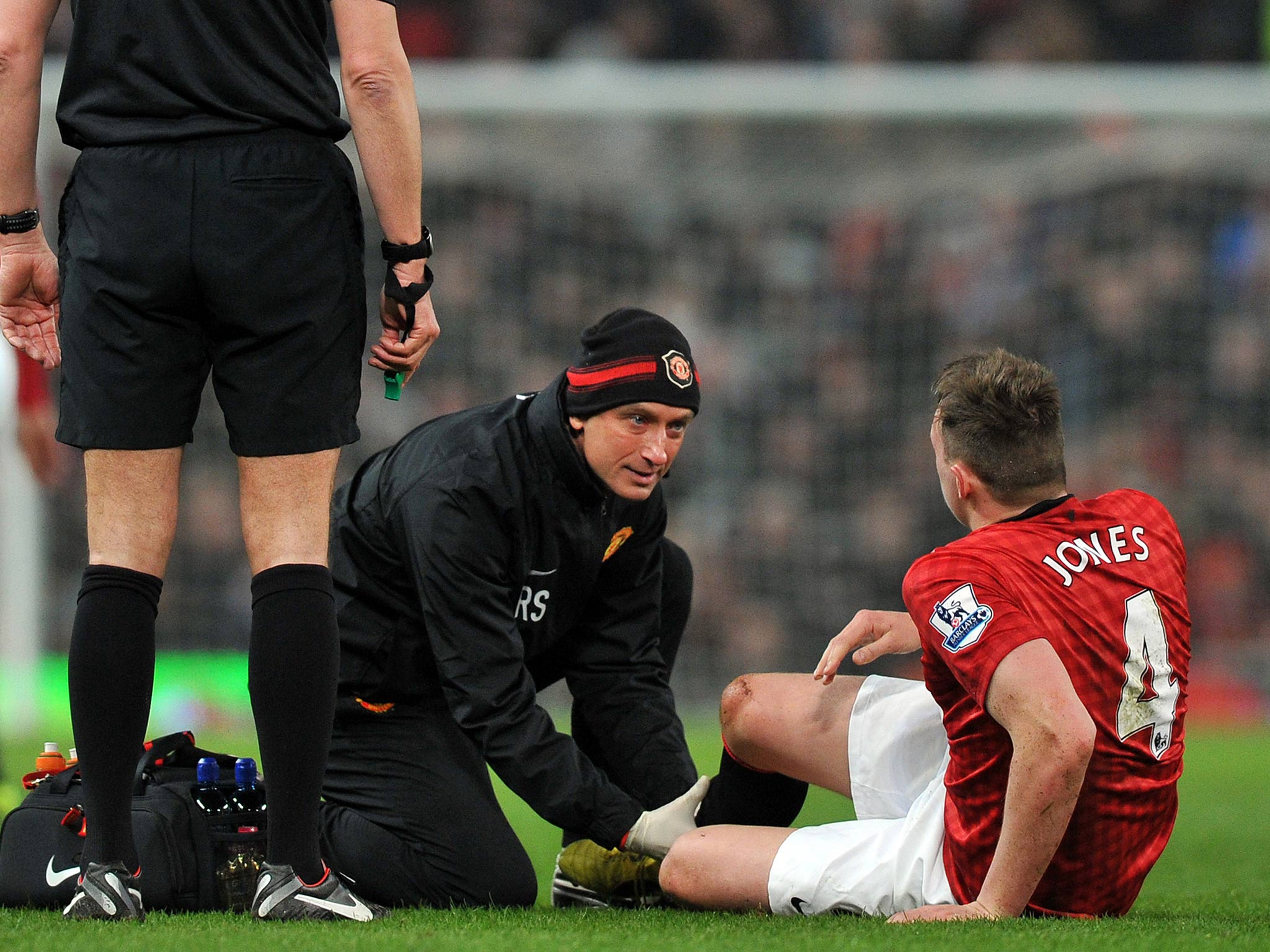 Manchester United player Phil Jones picks up an injury against Reading in the FA Cup