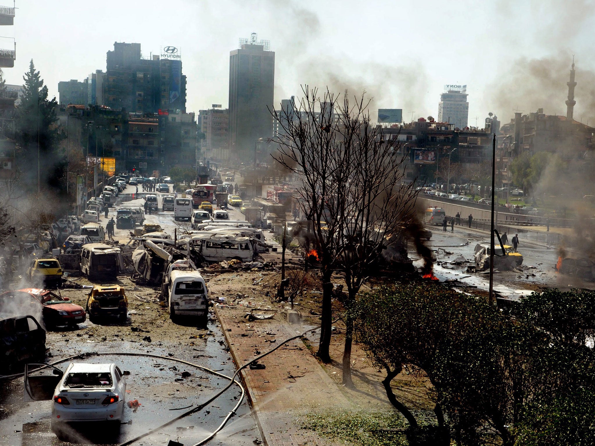 Aftermath of the deadly car bomb on a Damascus street