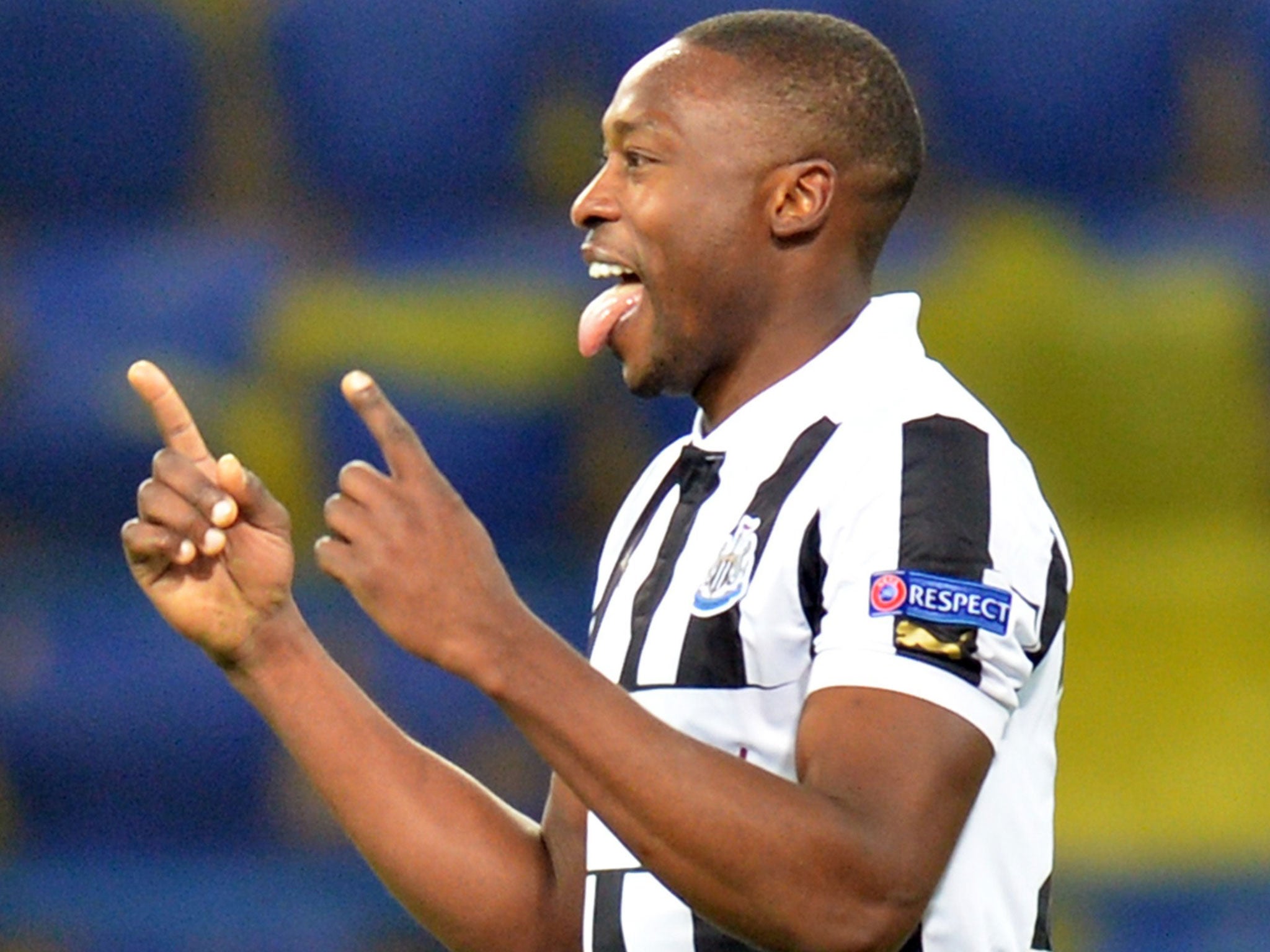 Shola Ameobi celebrates scoring from the spot in Ukraine last night