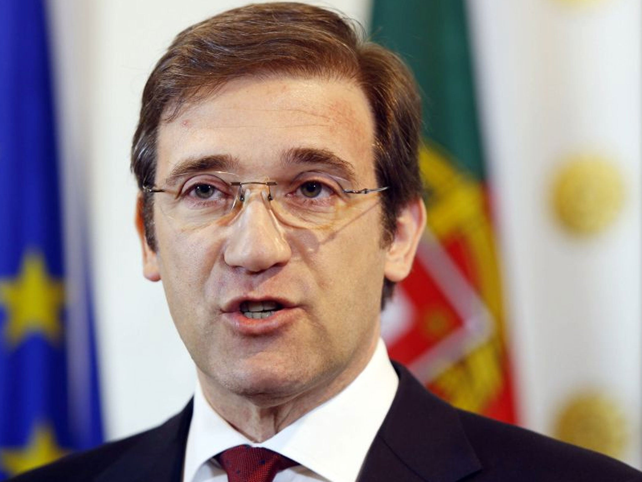 Portugal's Prime Minister Pedro Passos Coelho addresses a press conference in Vienna, Austria