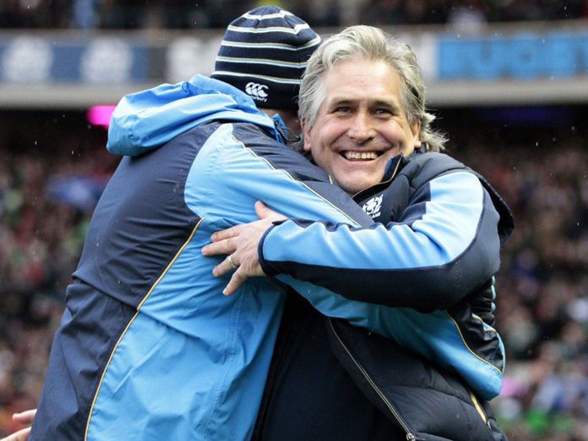 Scotland's head coach Scott Johnson (right) celebrates with an assistant after beating Ireland in their Six Nations Rugby Union match at Murrayfield Stadium in Edinburgh