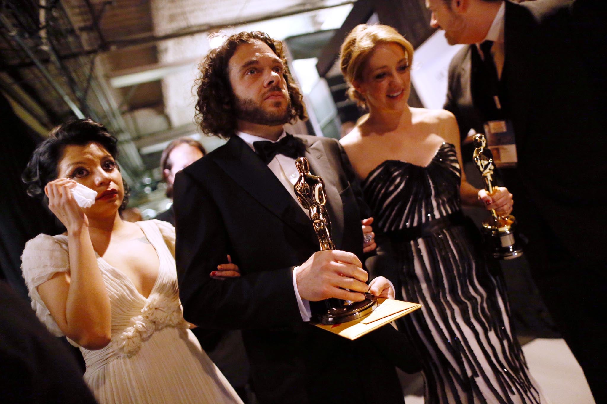 Filmmakers Sean Fine and Andrea Nix Fine, winners of the Best Documentary Short Subject award for 'Inocente,' backstage during the Oscars held at the Dolby Theatre on February 24, 2013 in Hollywood