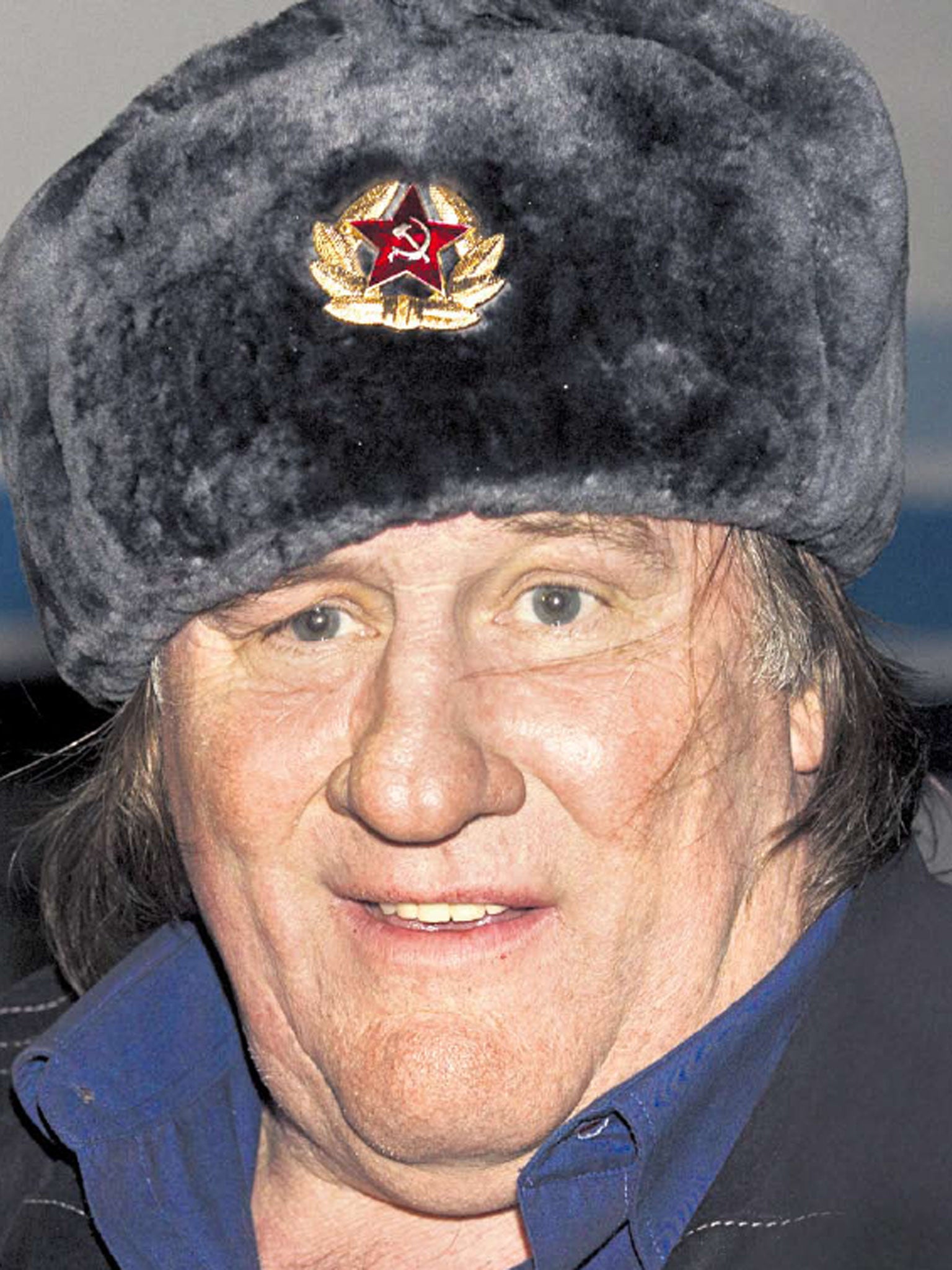 Gerard Depardieu wears a Soviet-style ushanka in Grozny, where he was welcomed by the Chechen President Ramzan Kadyrov