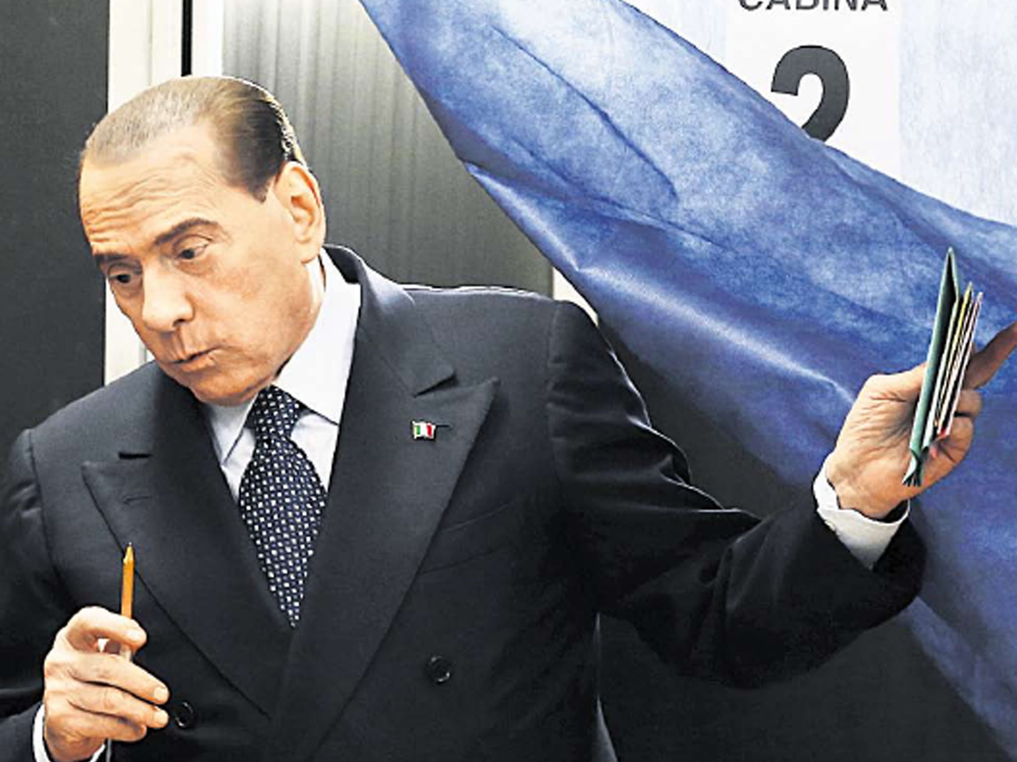 Silvio Berlusconi casts his vote in Milan