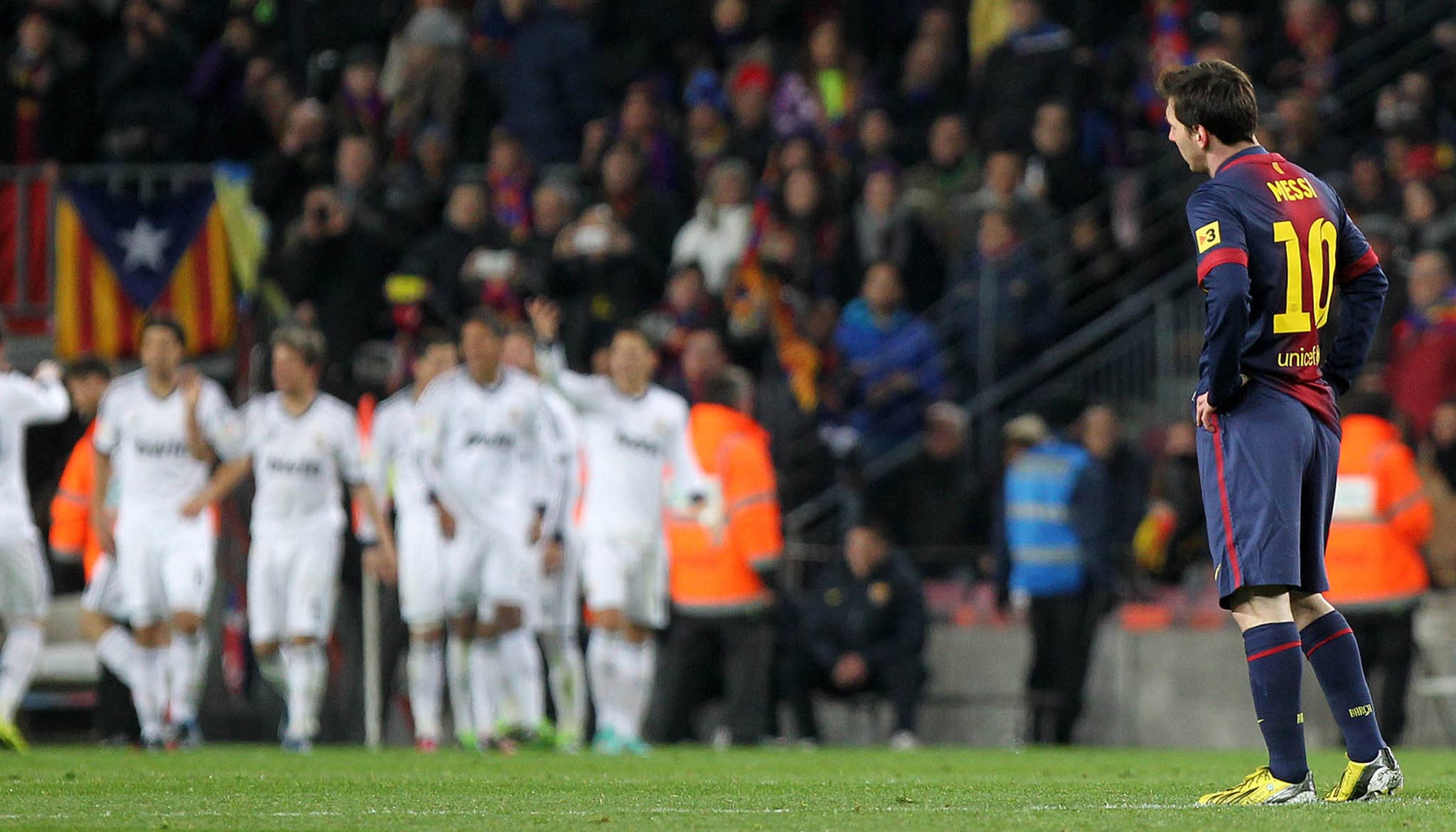 Lionel Messi looks on during 3-1 defeat to Real Madrid