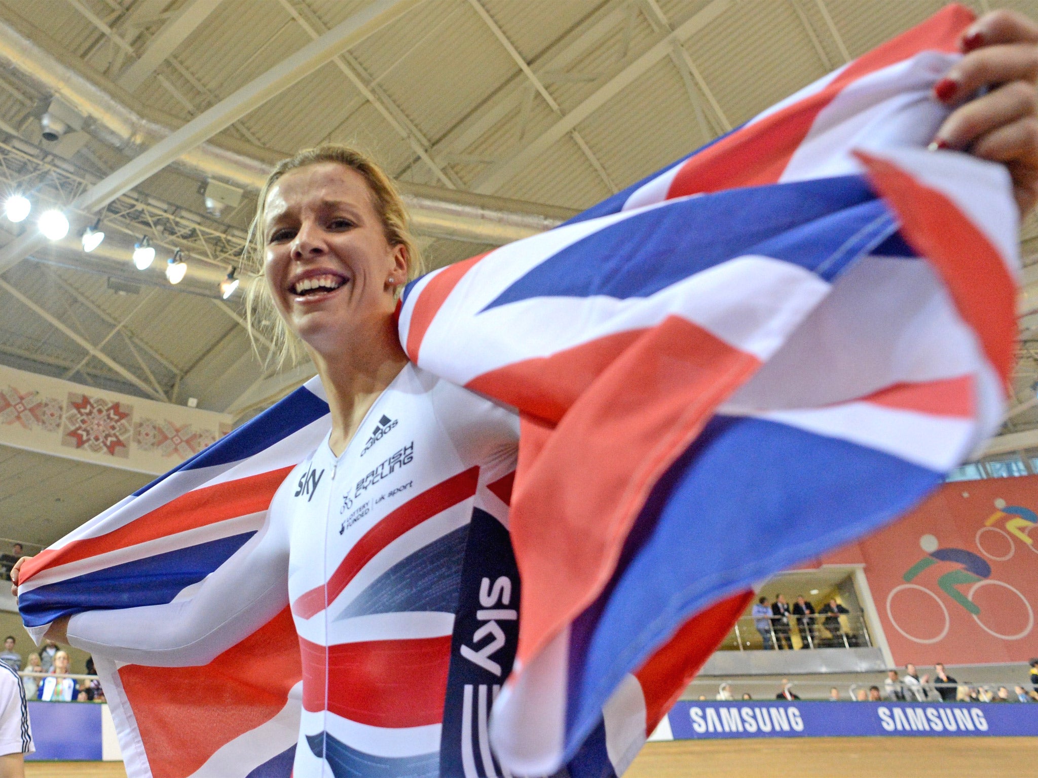 Becky James celebrates winning the keirin in Minsk