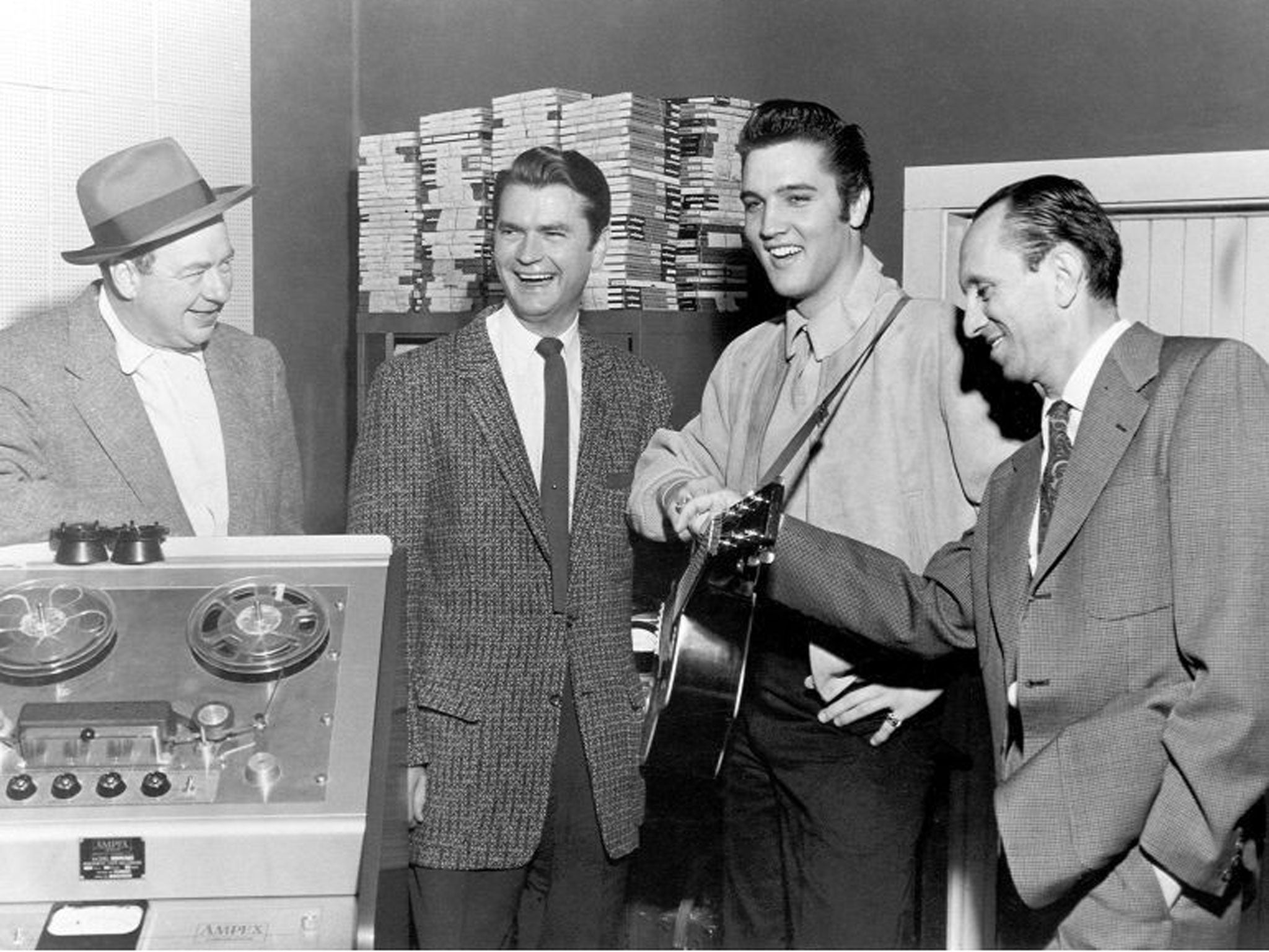 Sam Phillips (second from the left), with Elvis Presley, Leo Soroka and Robert Johnson at Sun Recording Studios in Memphis