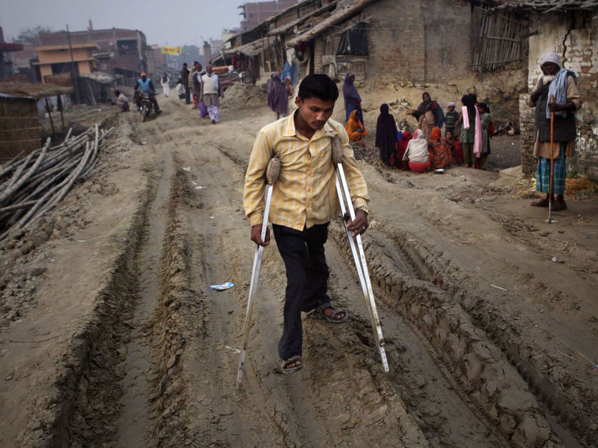 A polio sufferer in the village of Kosi in the north-east of India. Ninety-five per cent of Indian children have now been successfully vaccinated