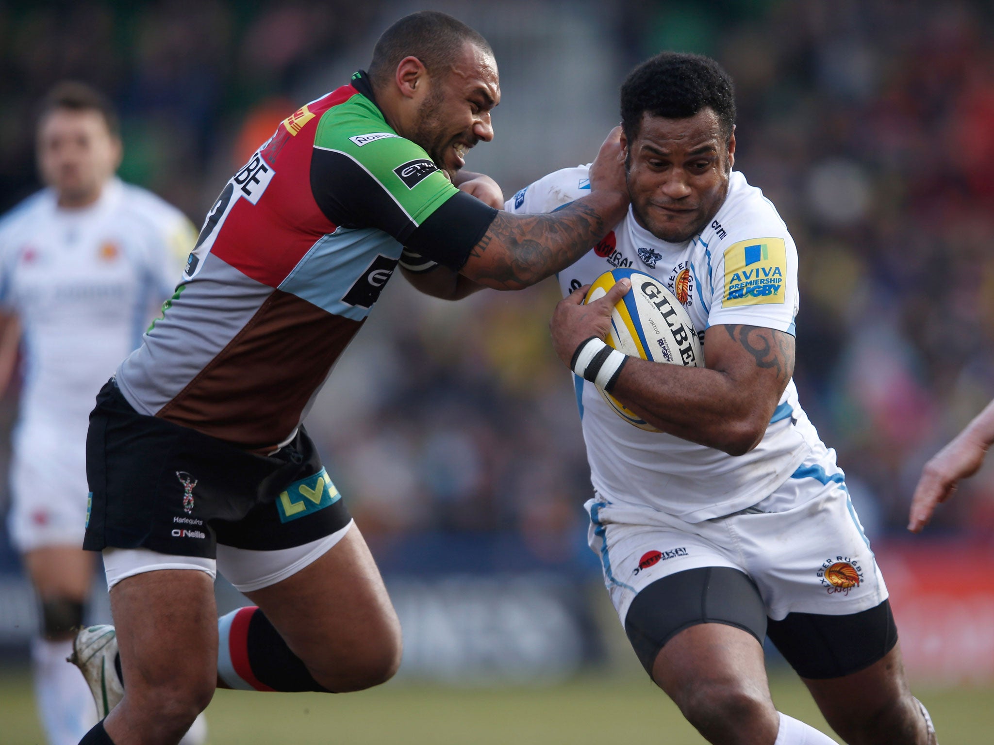 Sireli Naqelevuki of Exeter is tackled by Jordan Turner-Hall of Quins