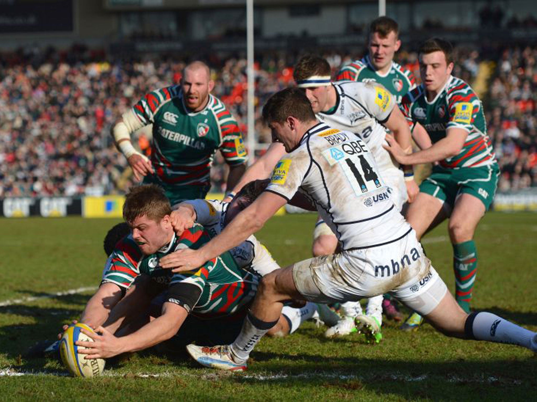 Leicester’s Ed Slater evades a late lunge to score a try in yesterday’s defeat of Sale