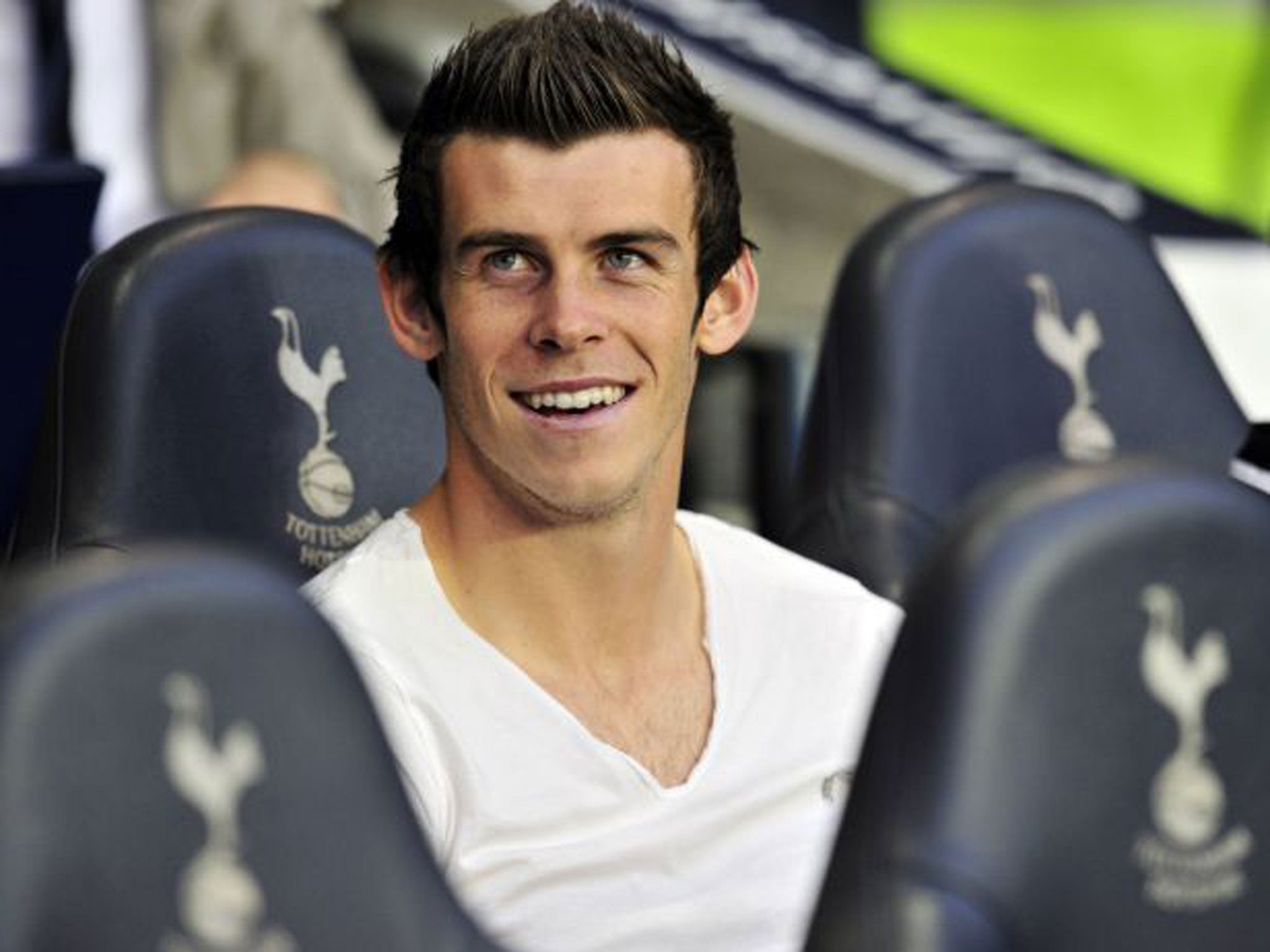 In the box seat: Life couldn’t be better for Gareth Bale but his family will make sure his feet stay on the ground