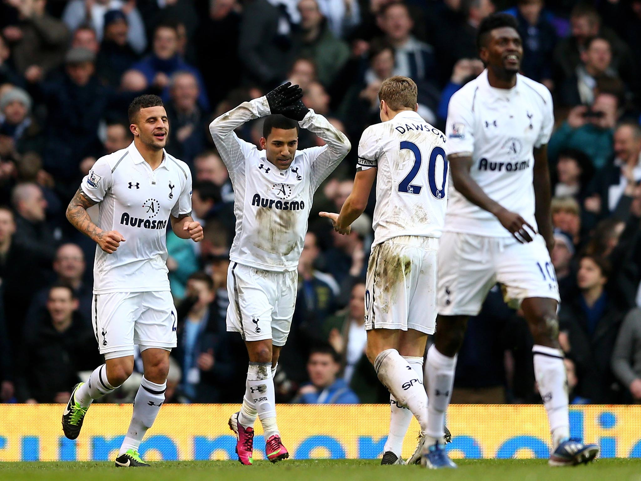 Aaron Lennon celebrates his goal against Arsenal