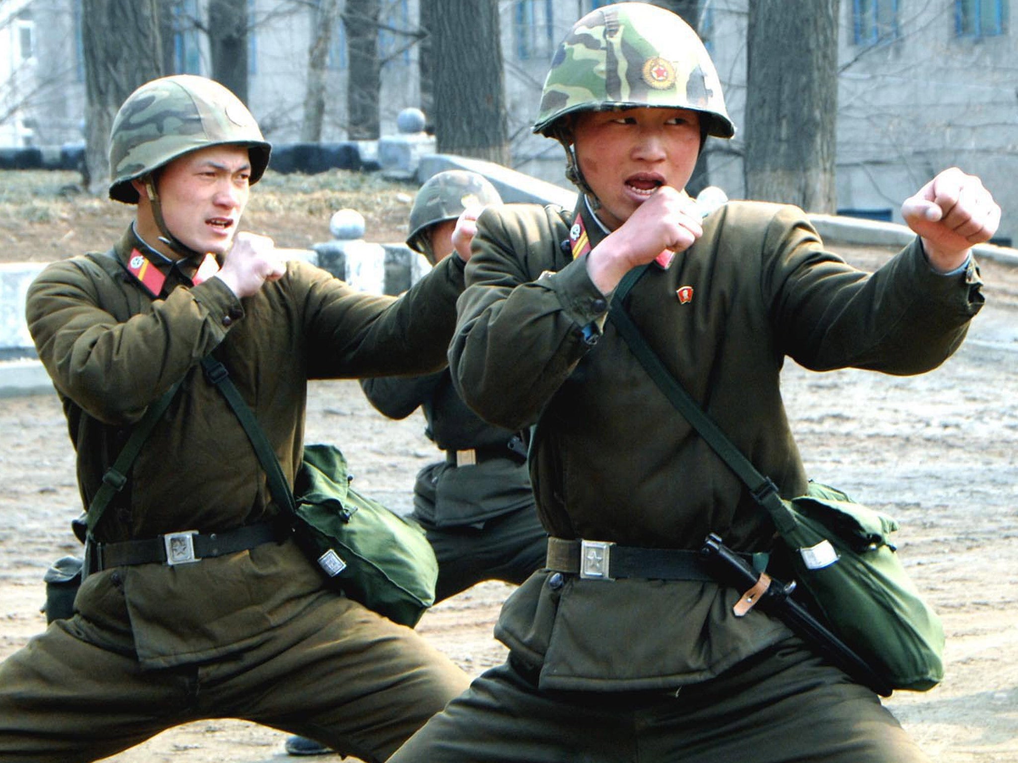 North Korean soldiers carry out combat training in a picture released yesterday by the North Korean Central News Agency