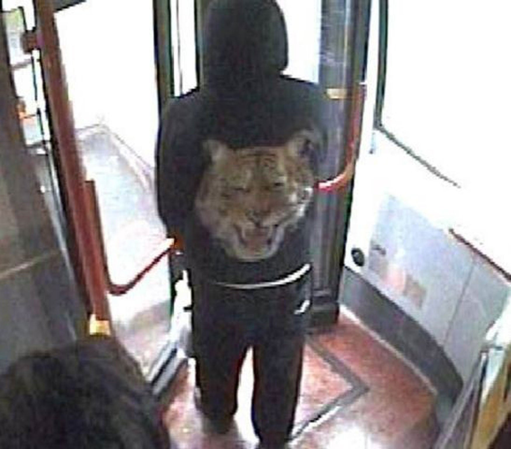 CCTV grab issued by West Midlands Police of a man wearing a distinctive tiger jacket on a bus as police have appealed to the people of Birmingham to let them know if they saw this man yesterday morning between 6 am and 1pm