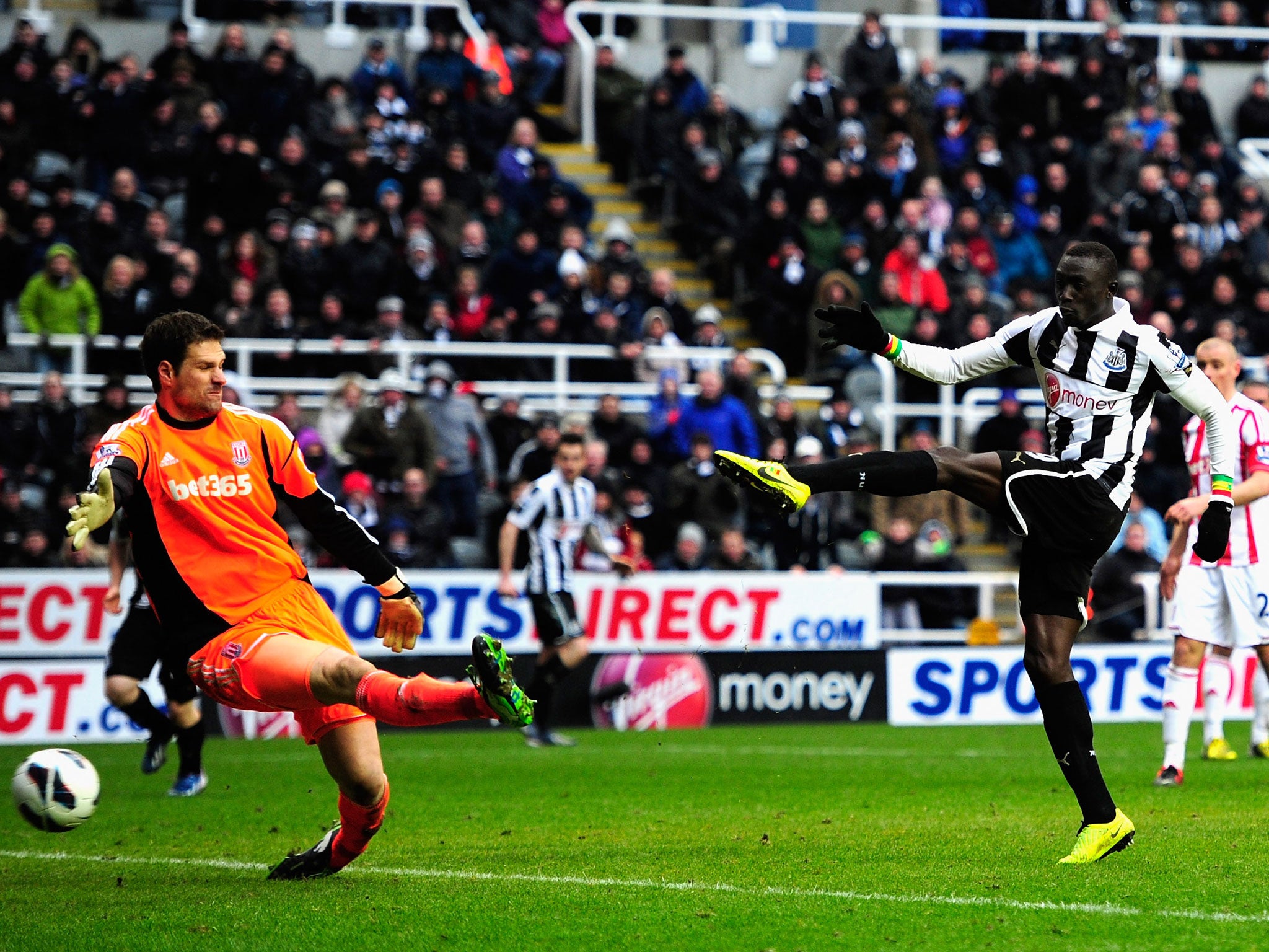 Stoke keeper Asmir Bergovic is beaten by Newcastle forward Papiss Cisse