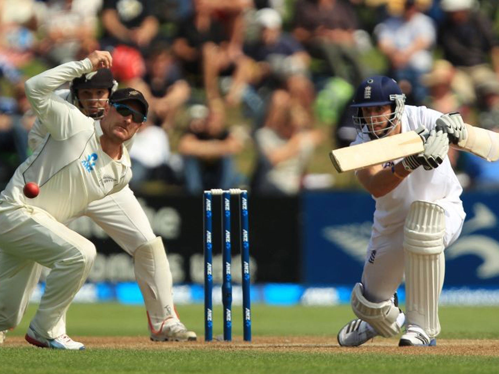 Steve Finn drives the ball past the New Zealand captain, Brendon McCullum, during his marathon innings