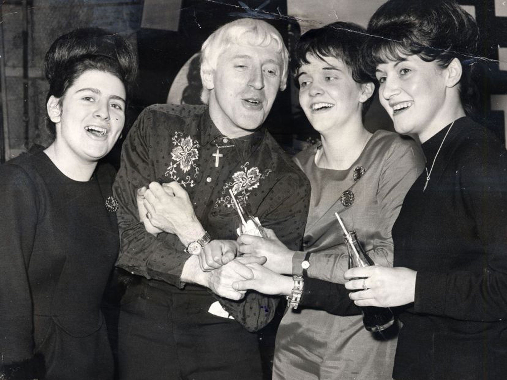 Jimmy Savile with Beatles fans in 1965Jimmy Savile with Beatles fans in 1965