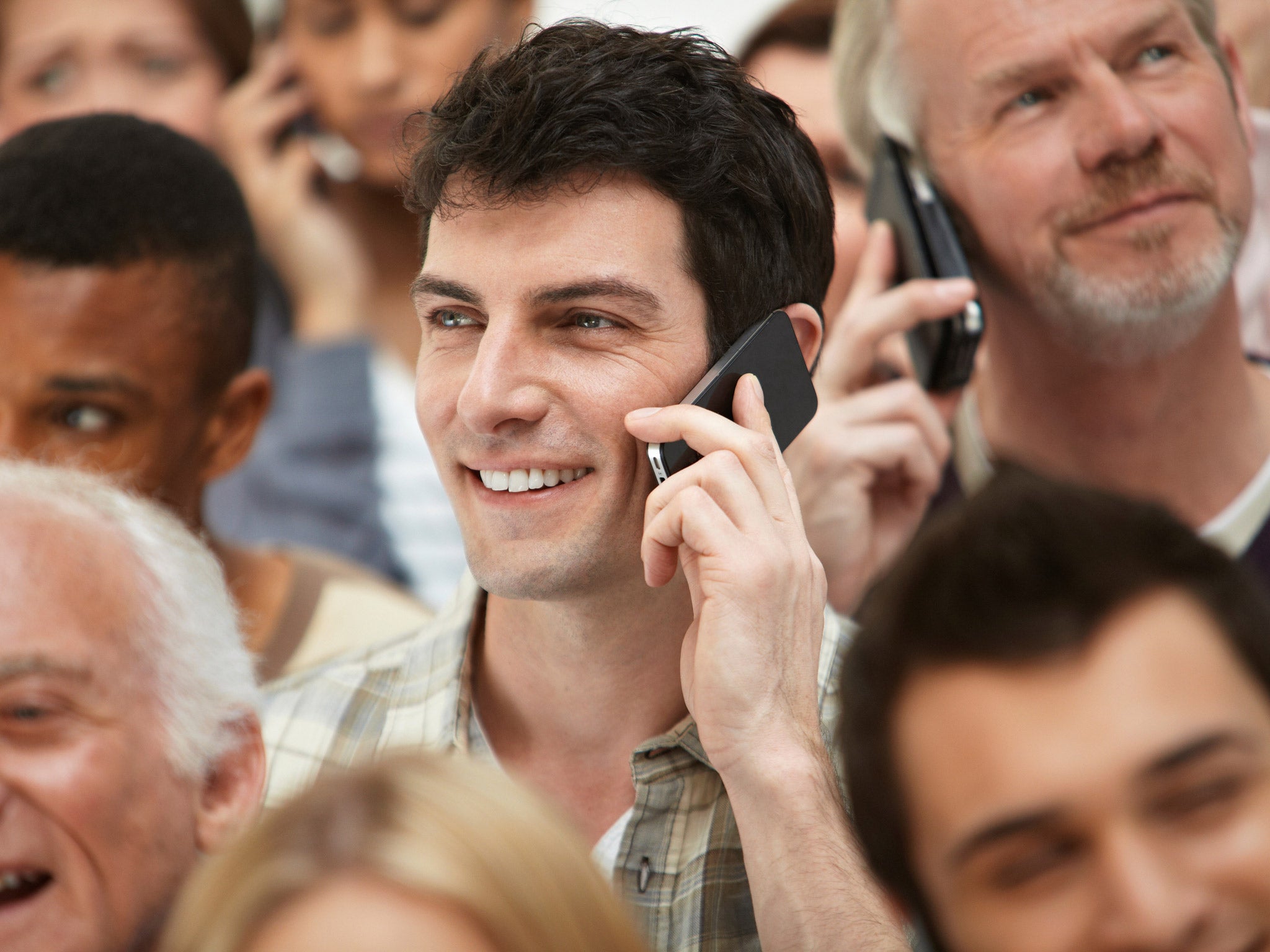 Mobile phone conversations often seem more intrusive than the general hubbub of people talking to one another