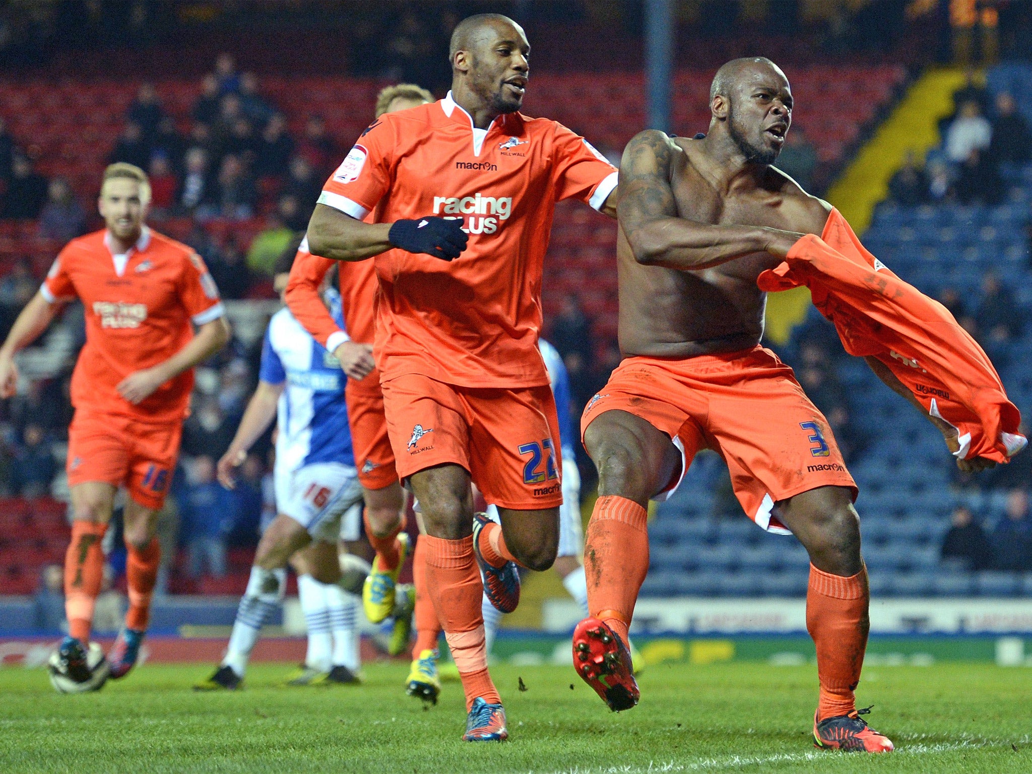 The Millwall captain, Danny Shittu, celebrates his winning goal