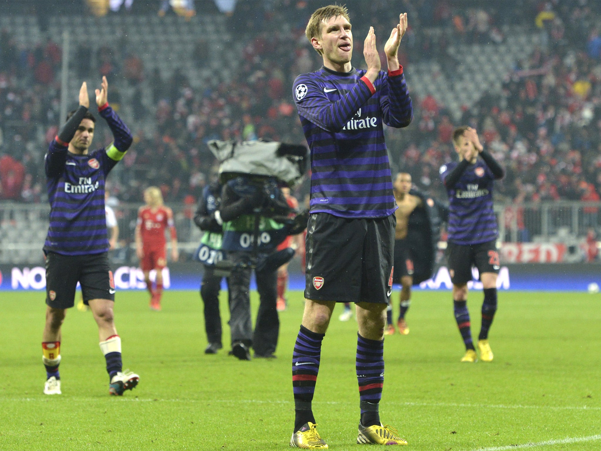 The Arsenal players thank their away support after just coming up short