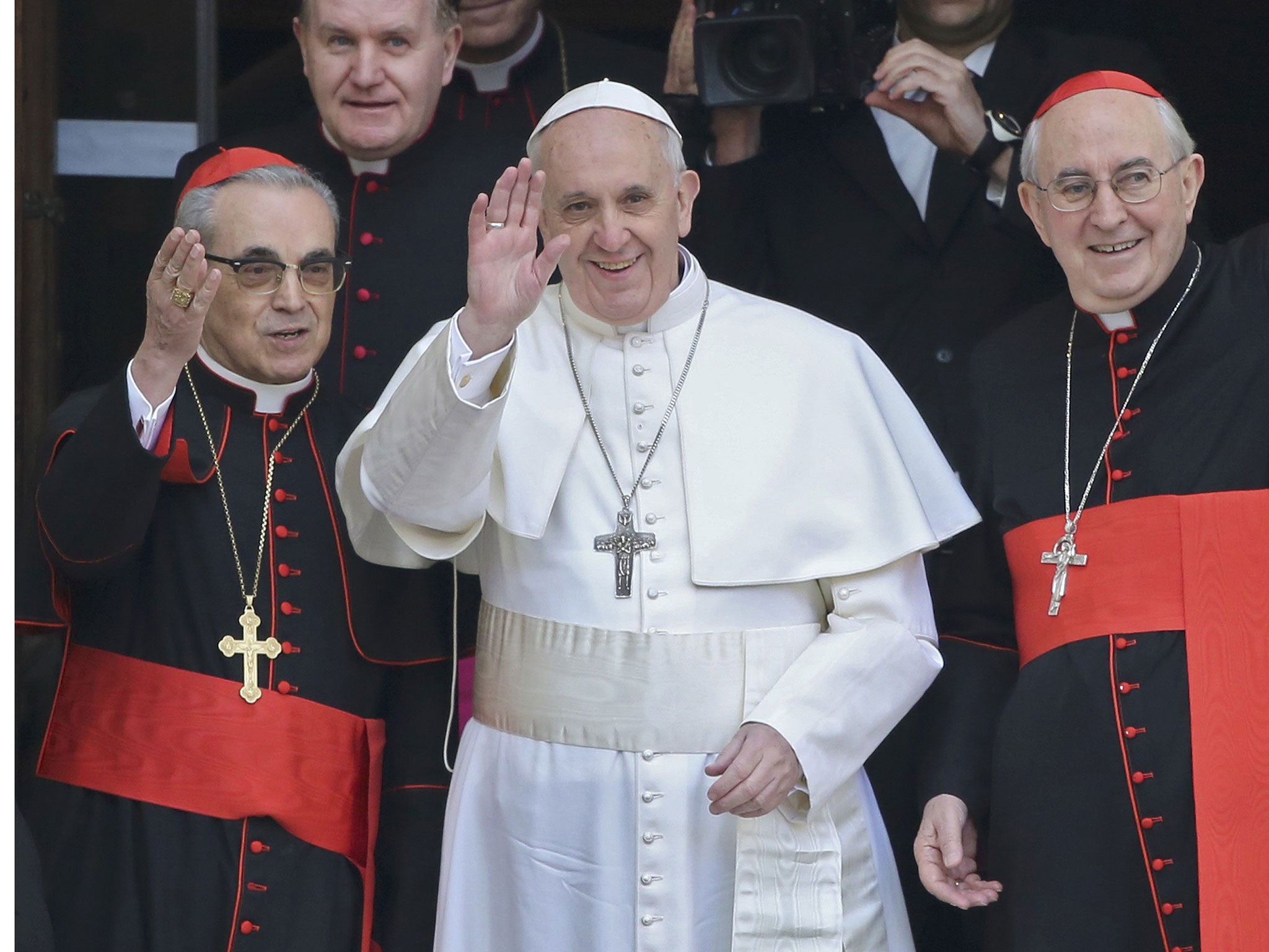 Newly elected Pope Francis, Cardinal Jorge Mario Bergoglio of Argentina waves from the steps of the Santa Maria Maggiore Basilica in Rome