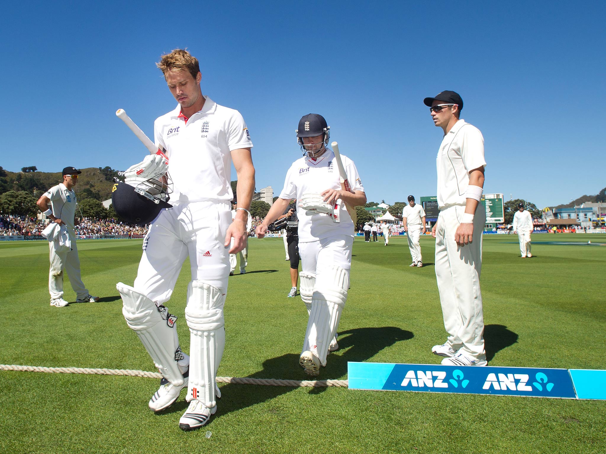 Jonathan Trott and Nick Compton leave the field of play after the first day of the second Test between England and New Zealand