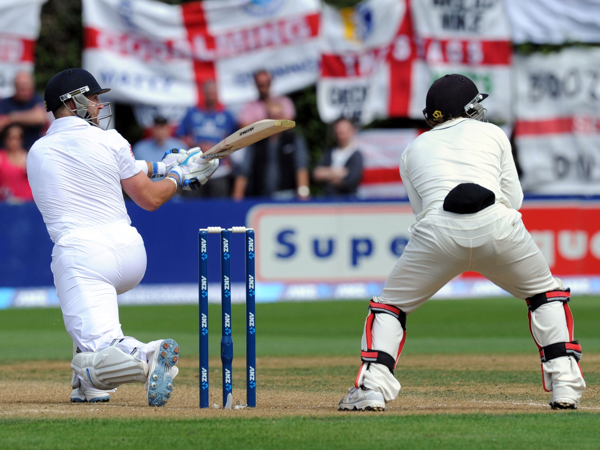 Matt Prior, left, reverse sweeps in front of New Zealand wicketkeeper BJ Watling