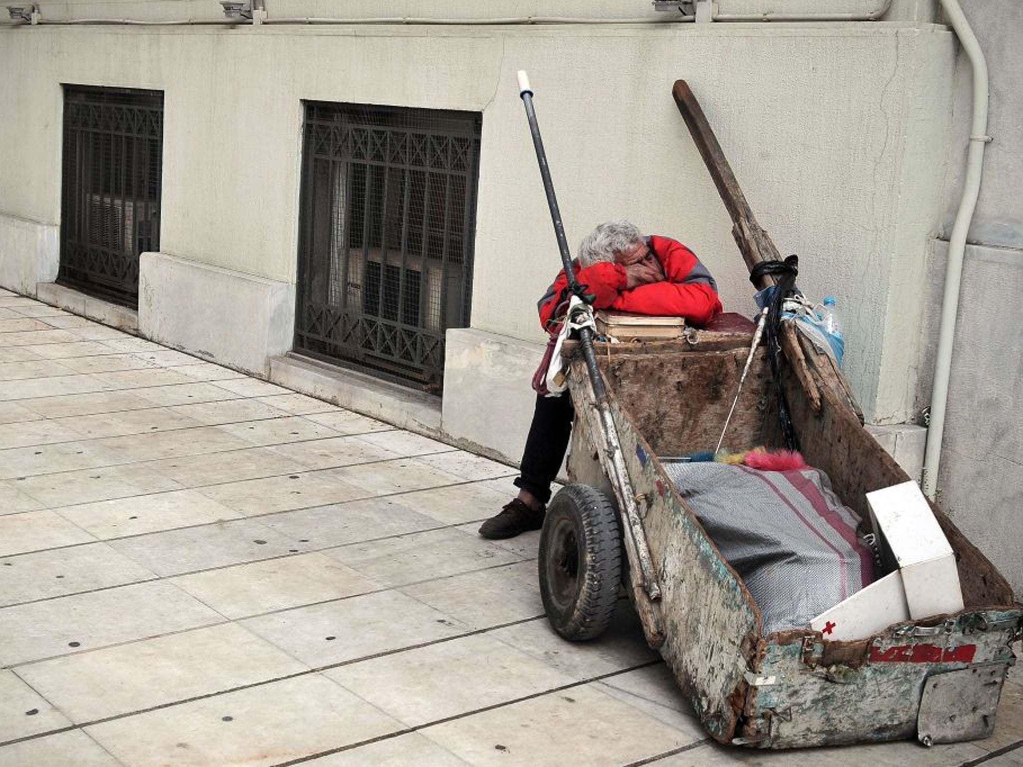 A scavenger in central Athens: the eurozone crisis has not been solved