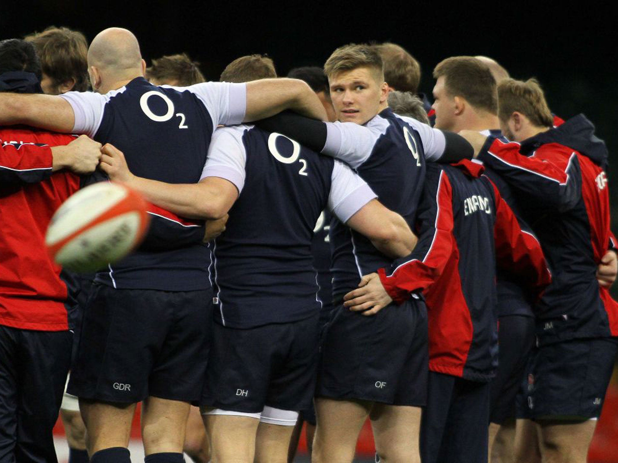 Owen Farrell takes a glance during training, more than aware of the skills of Leigh Halfpenny