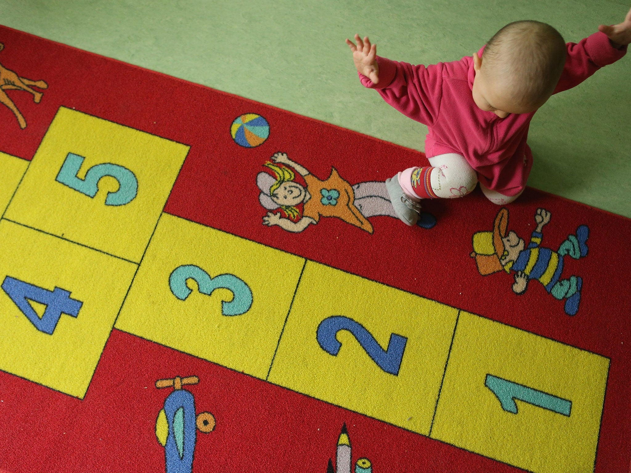 Numbers game: Parents struggling with the rising cost of childcare were to be given tax allowances of up to £1,000