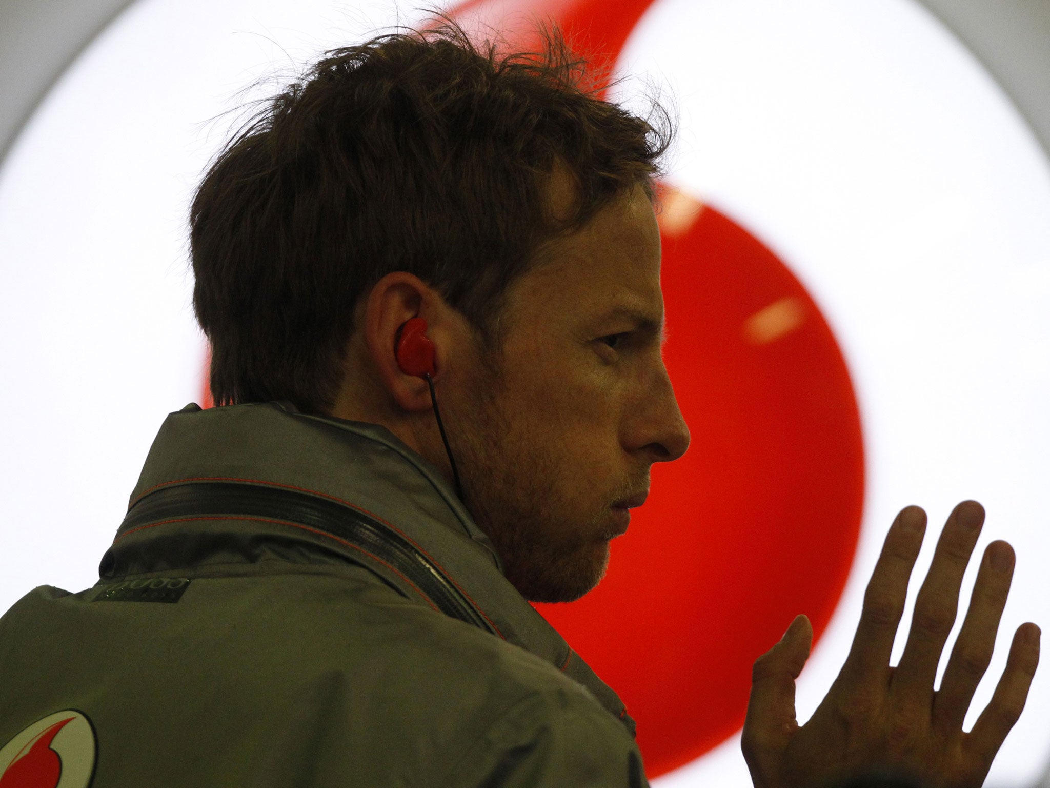 Jenson Button gives a wave of relief