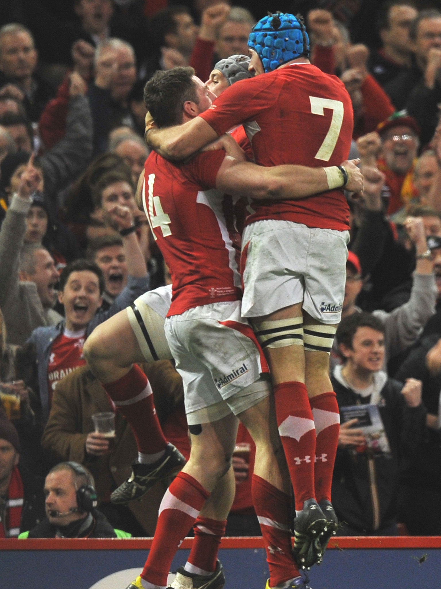 Scarlet fever: Wales wing Alex Cuthbert (left) celebrates with flanker Justin Tipuric after scoring the first of his two tries