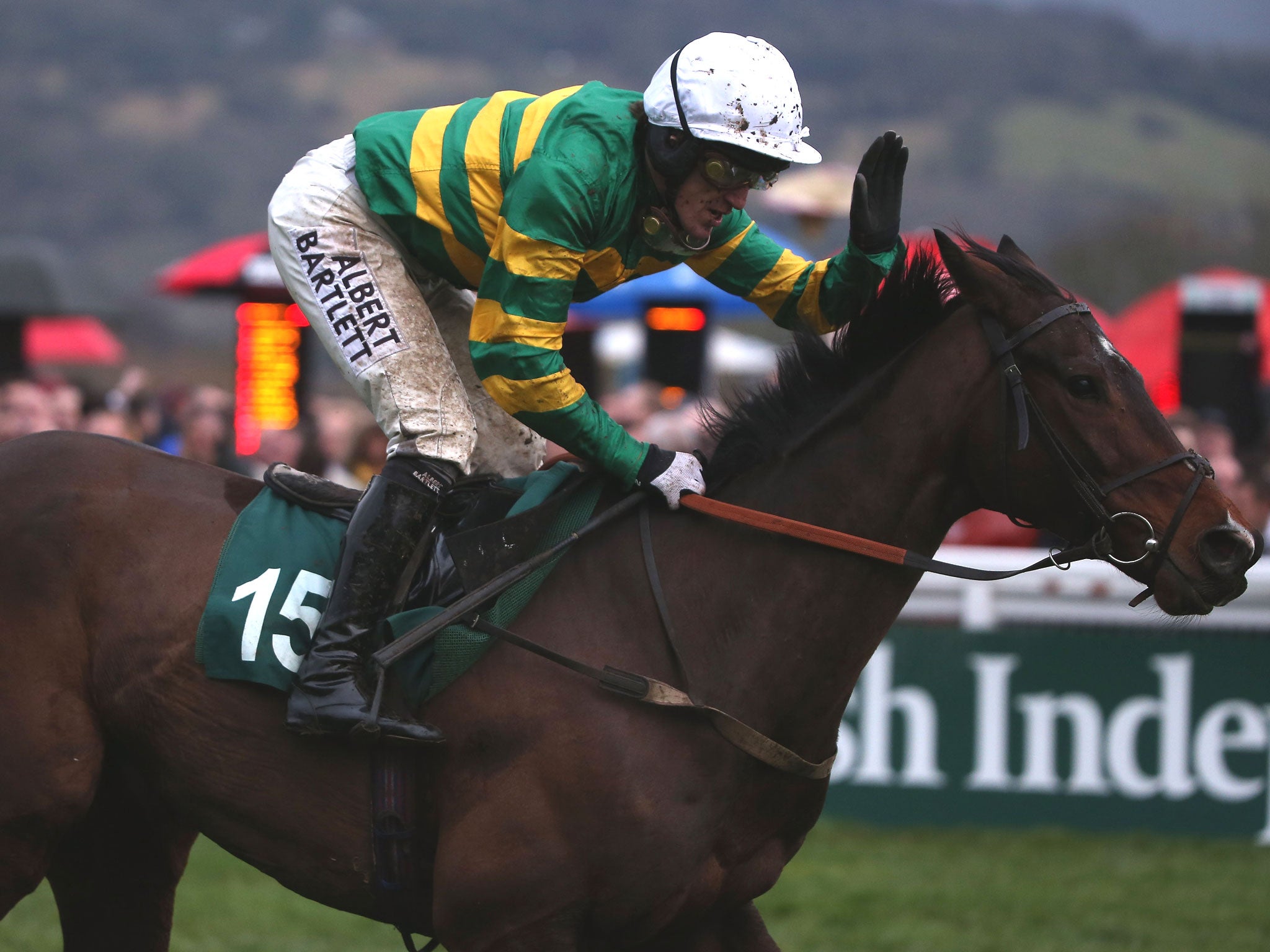 Tony McCoy pats Alderwood after winning Cheltenham’s final race