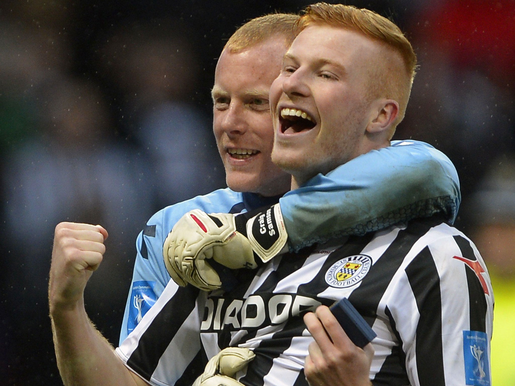 Scorer Connor Newton (right) celebrates with Craig Samson