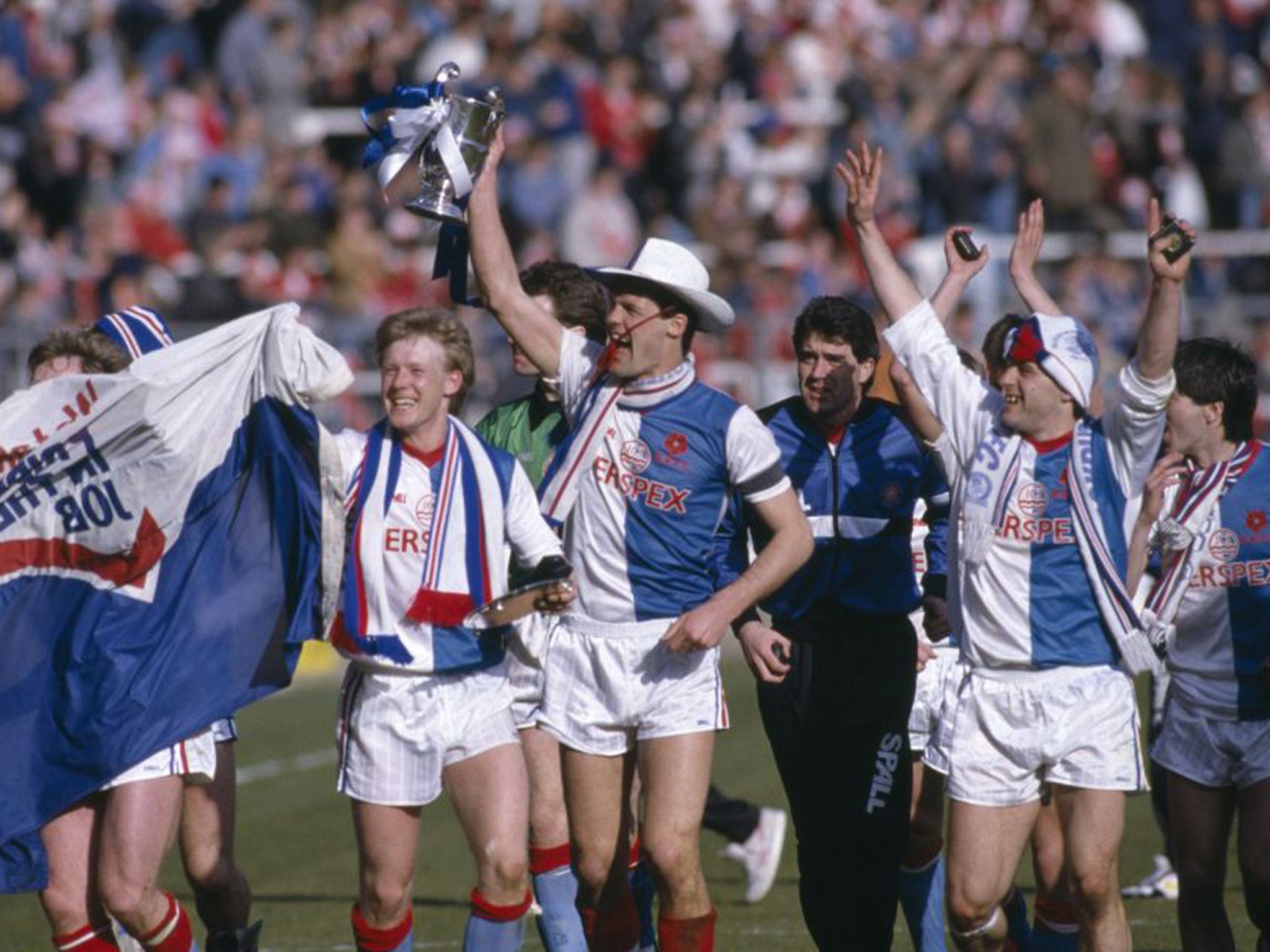 Glenn Keeley holds aloft the Full Members Cup in 1987