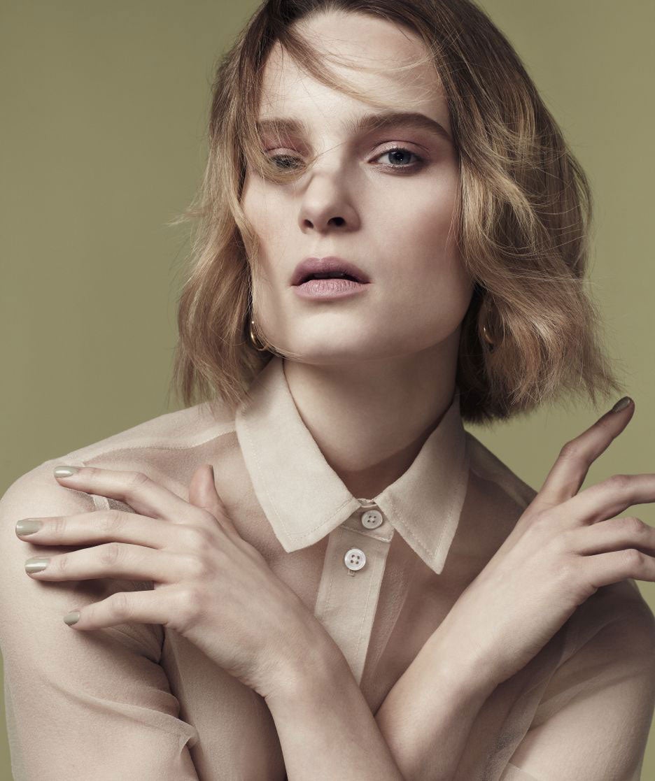 Sheer cropped silk blouse, £508, by Marc Jacobs, 56 South Audley Street, London W1, 020-7399 1690; earrings (worn throughout), stylist's own.
Styling: Gemma Hayward. Photography: Patrick Lindblom