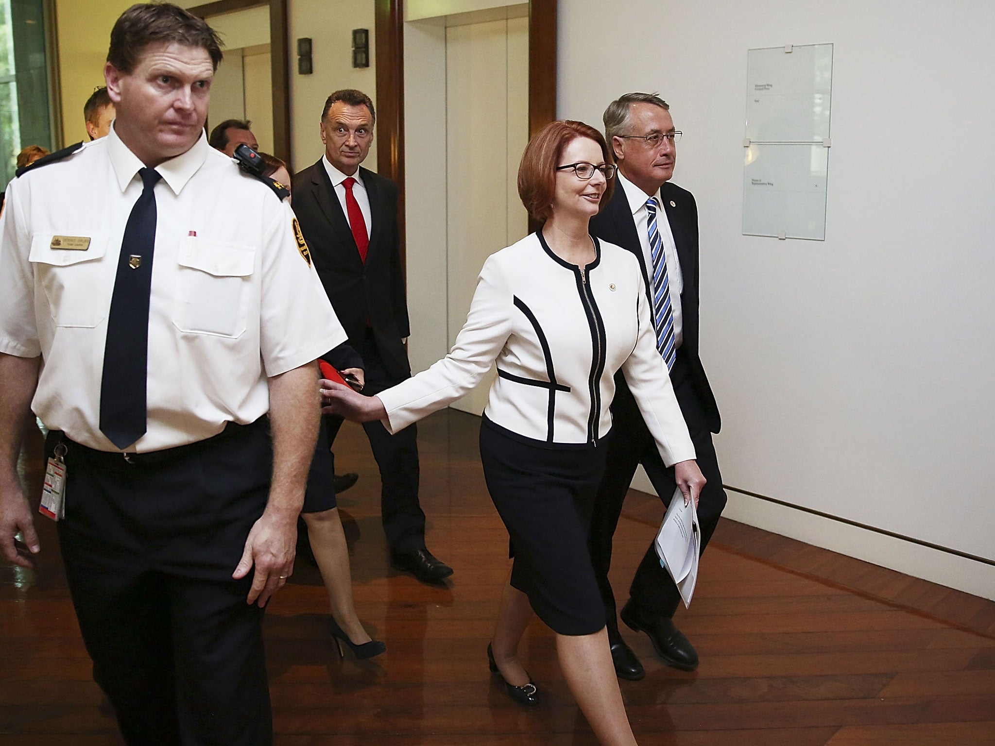 Julia Gillard remains Australia's prime minister after she threw her job open to a leadership ballot but no one was willing to run against her