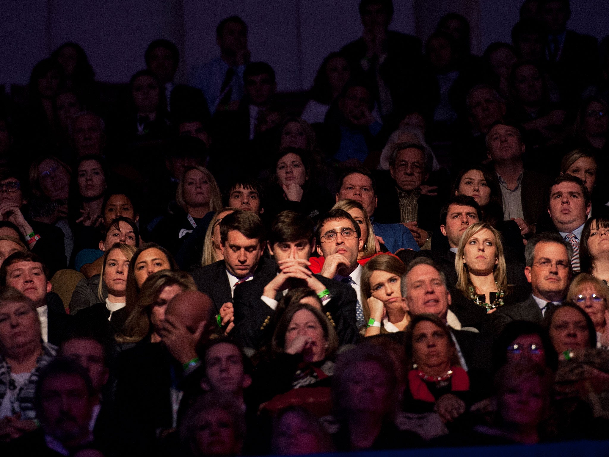 Members of the audience listen at a conference. 19 Jan 2012