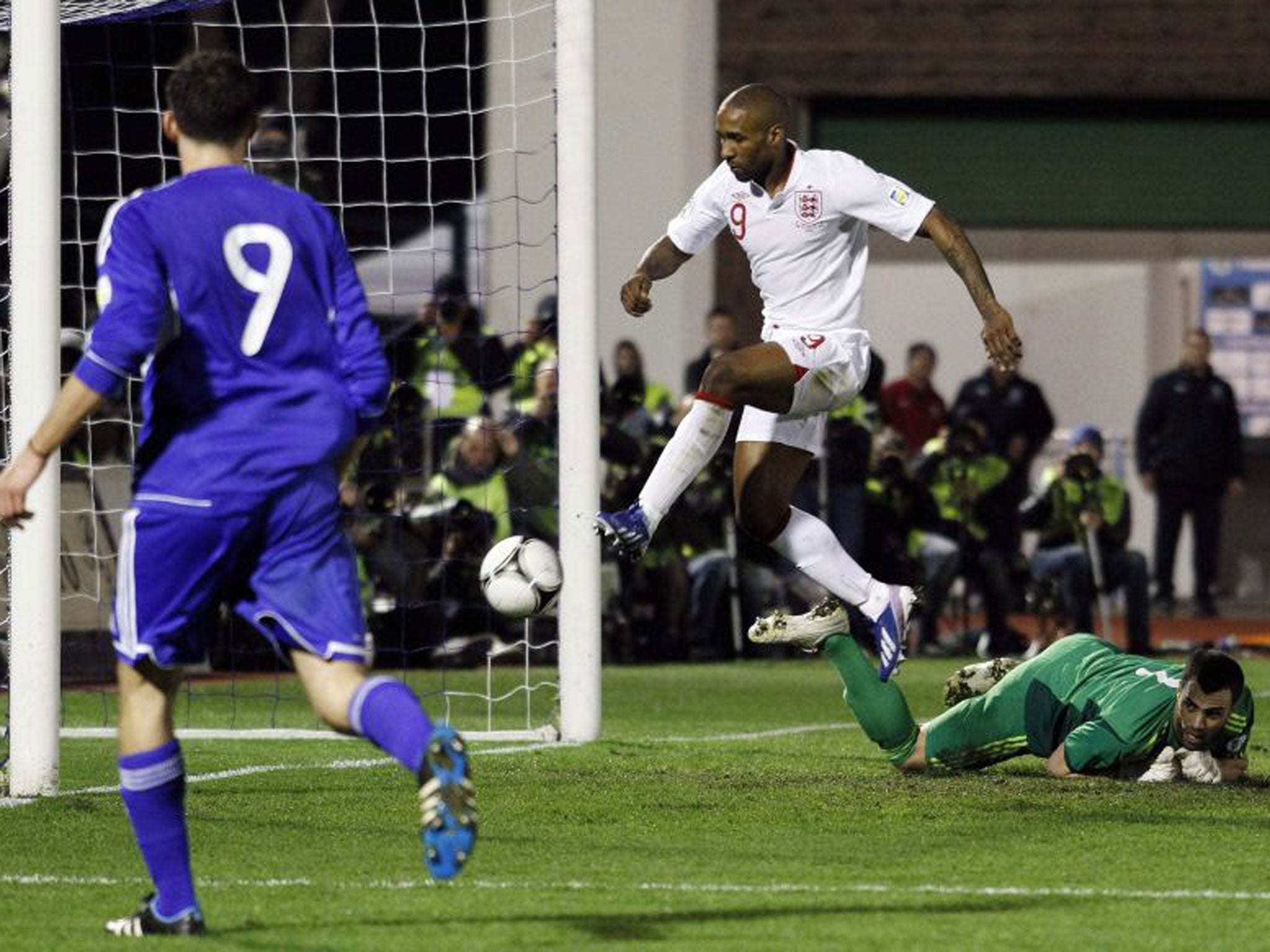 Jermain Defoe taps in his goal for England