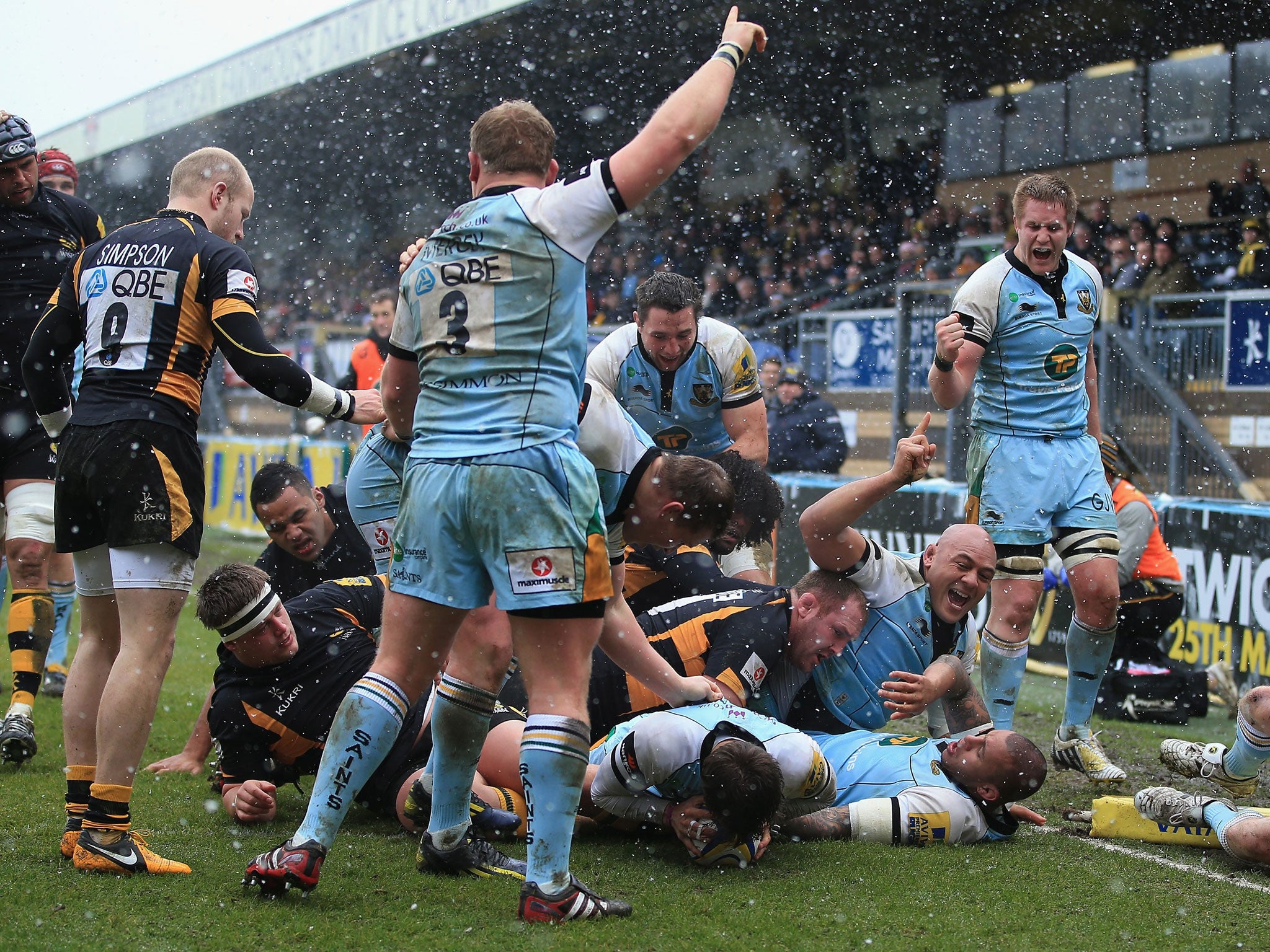 Heap of fun: Lee Dickson grabs Saints second