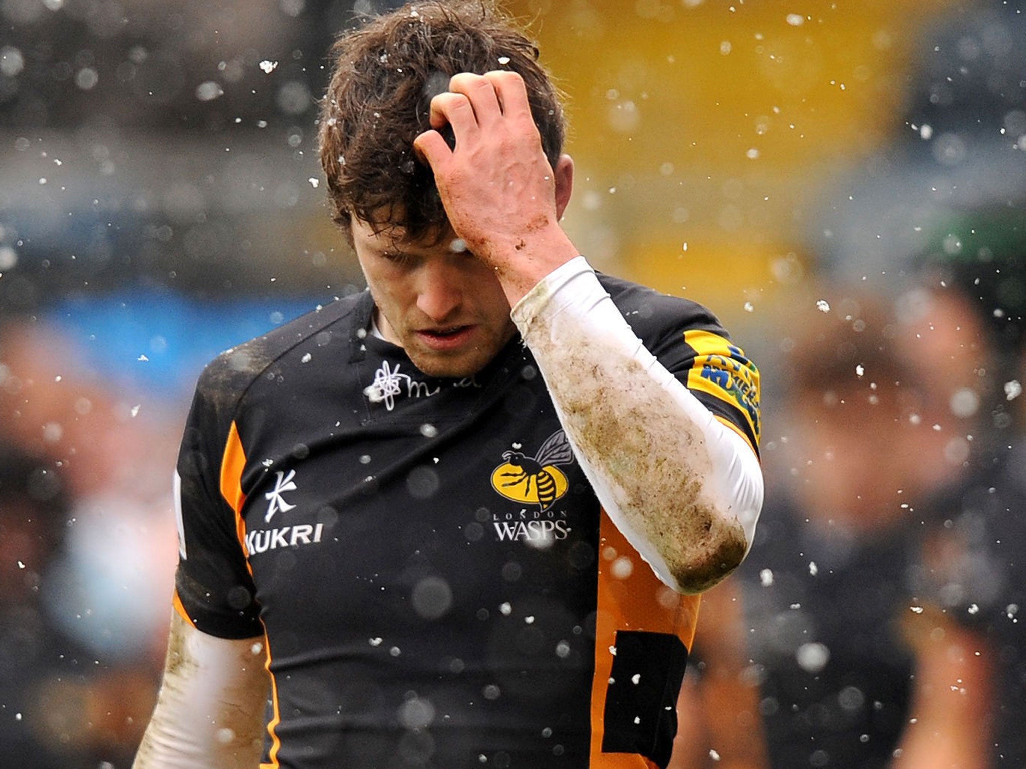 Elliot Daly scratches his head