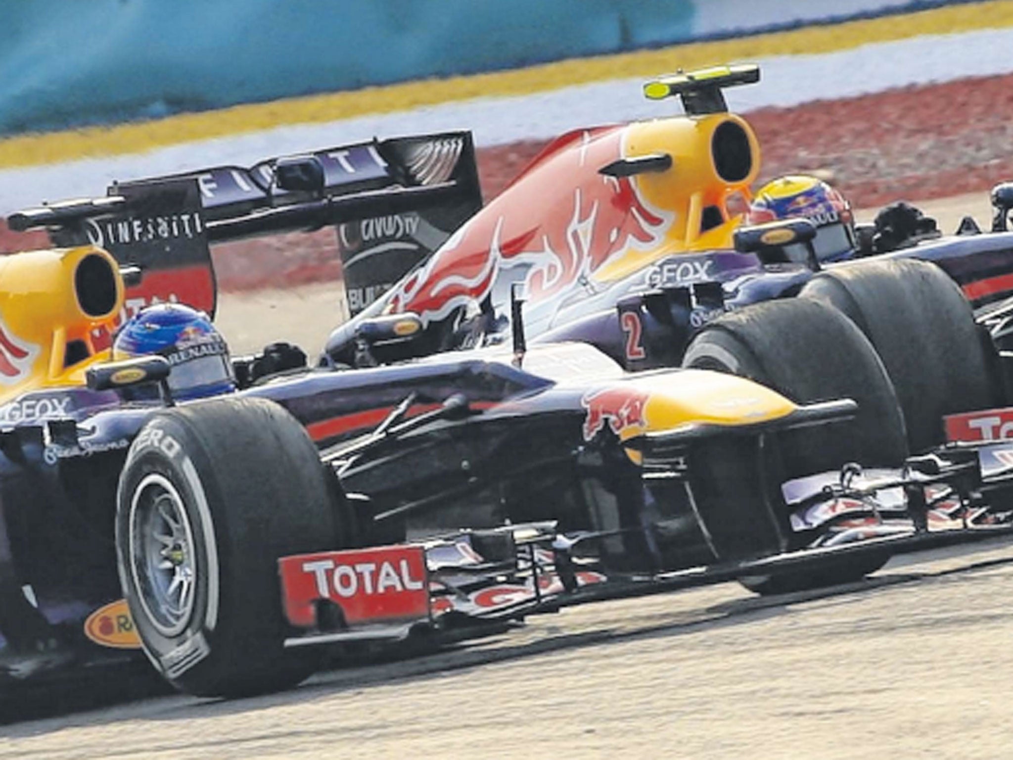 Seb Vettel passes Mark Webber yesterday despite team orders not to do so