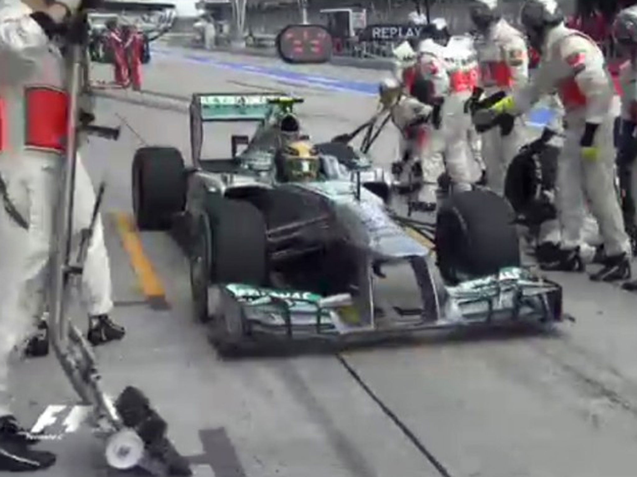 Lewis Hamilton inadvertantly pulls into the McLaren pit